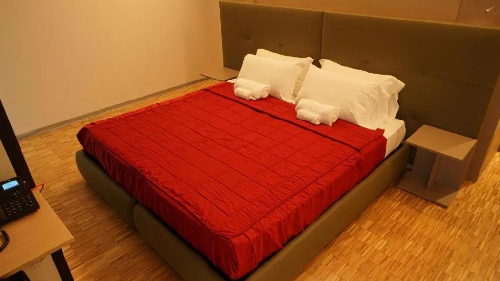 Bed in Valmarana Morosini Hotel