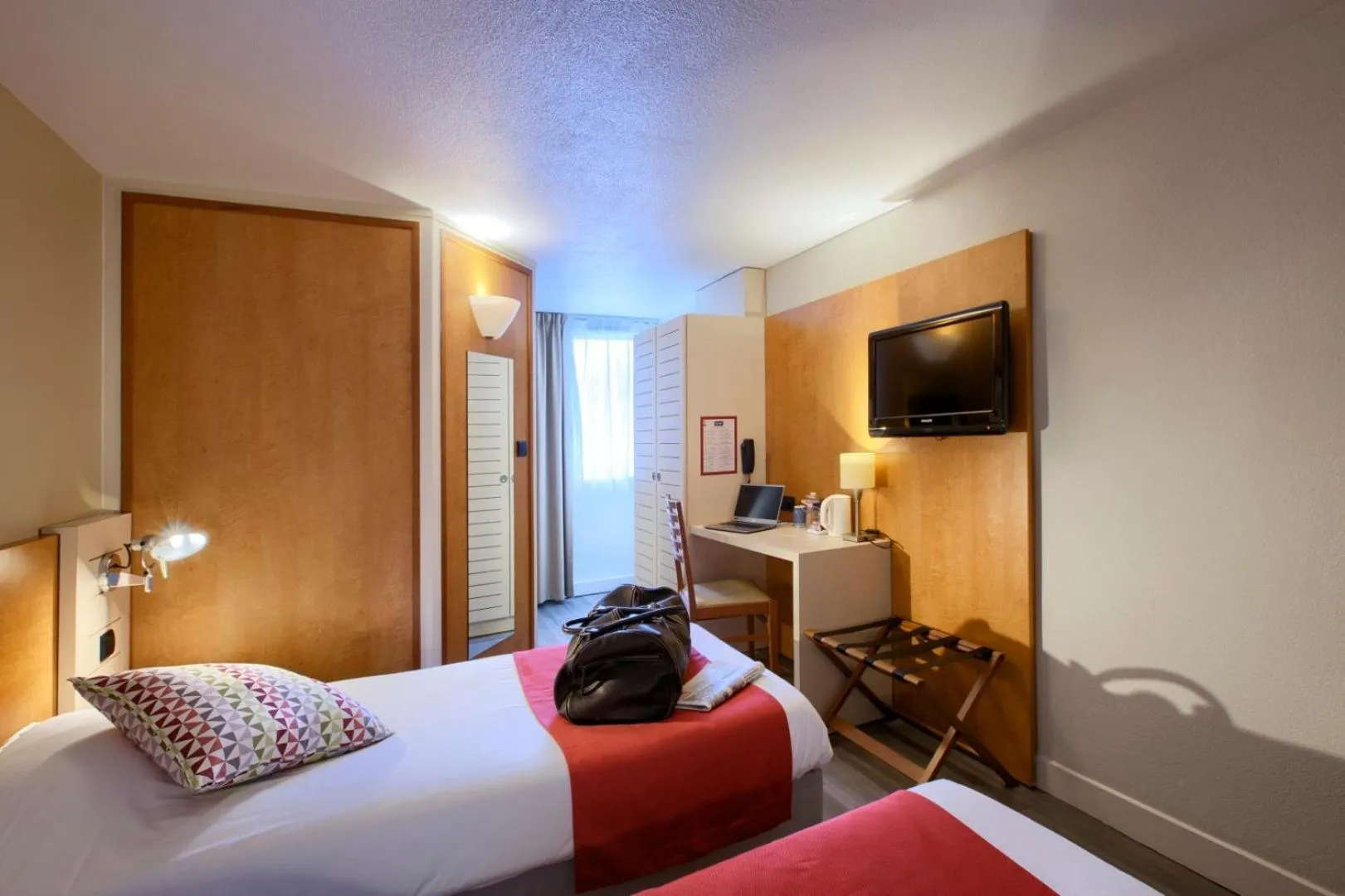 Bed in Kyriad Libourne Saint Emilion