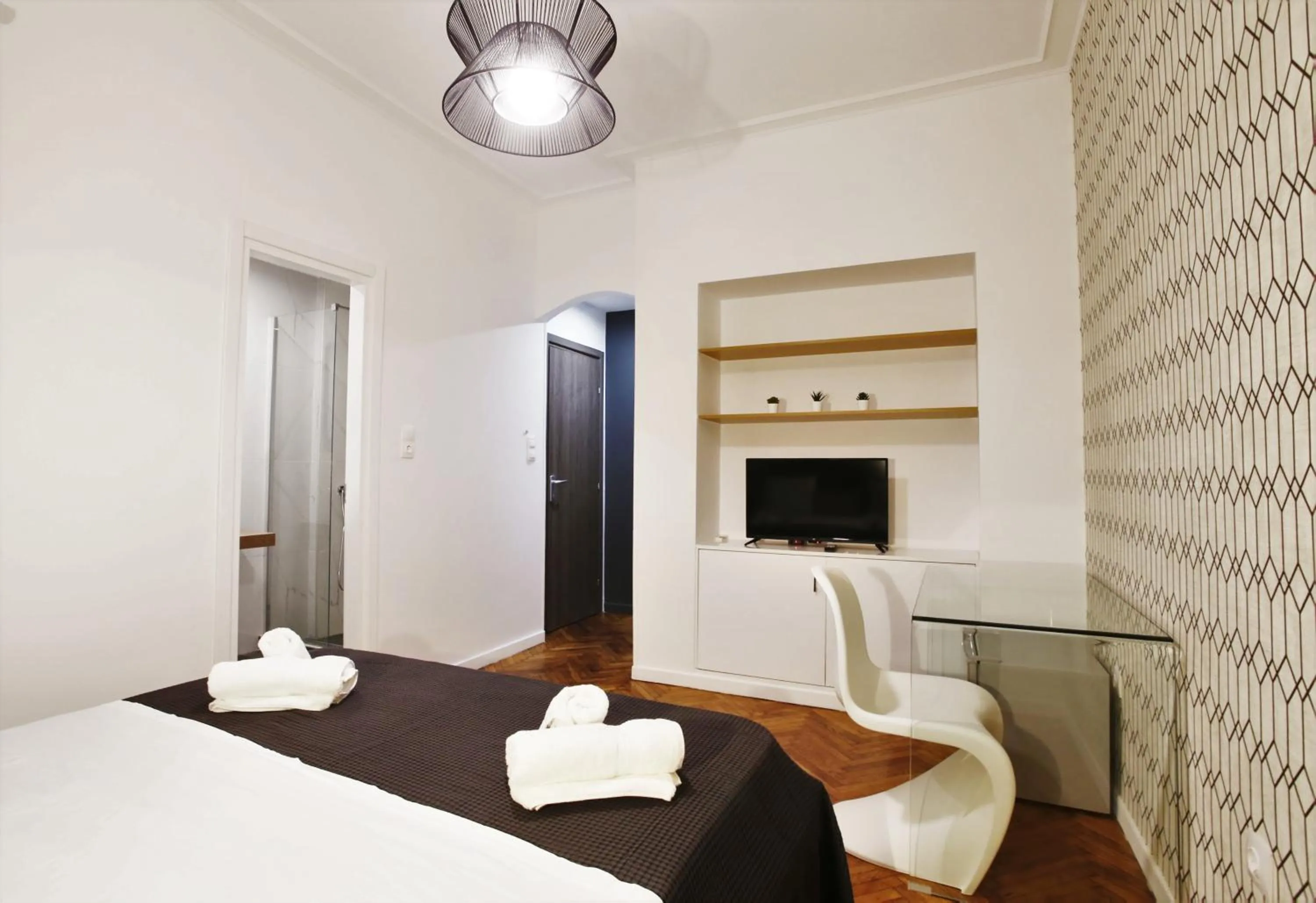 Photo of the whole room, Bed in GK Niki by GK Properties