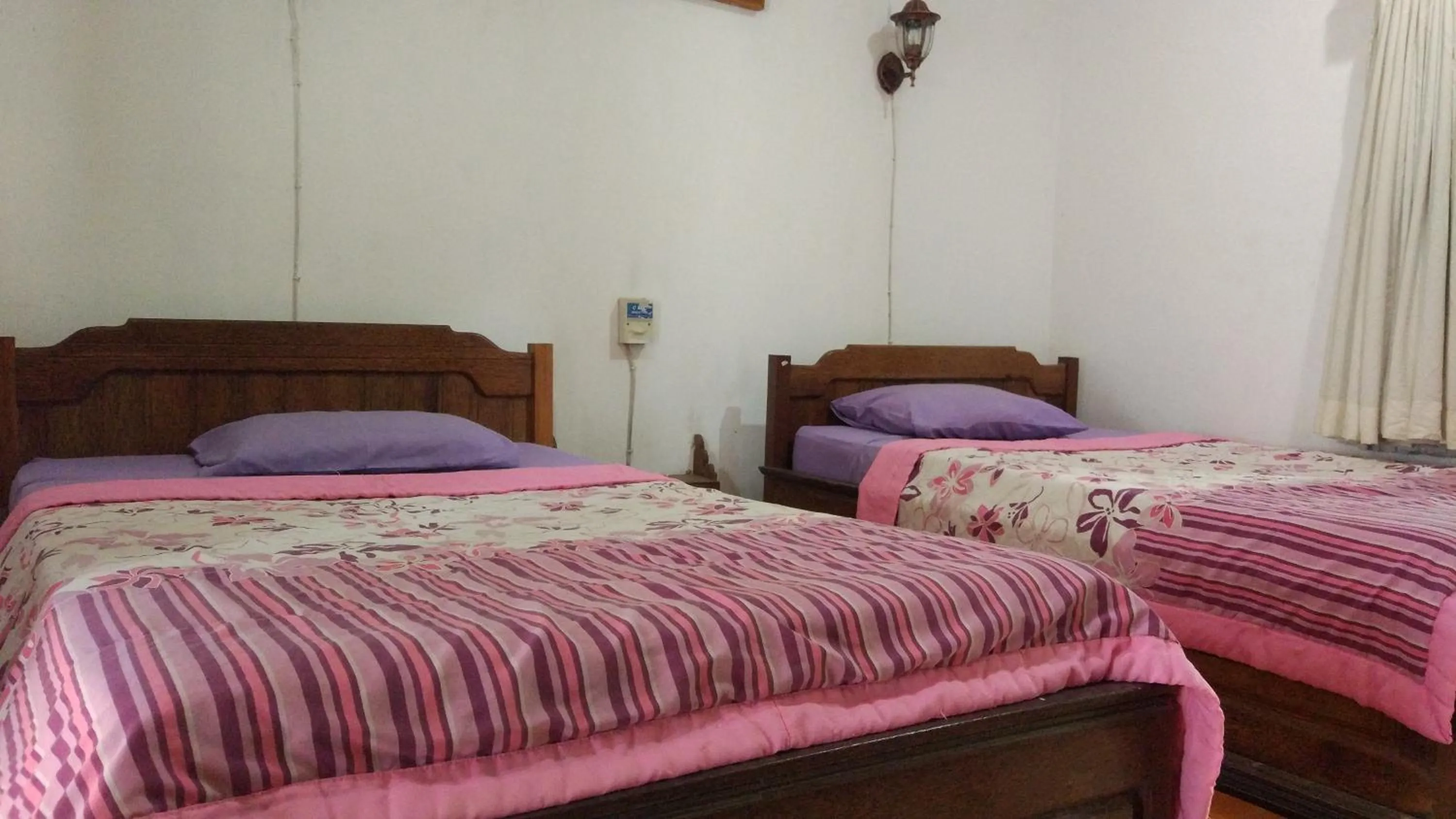 Bed in Puri Bebengan Bungalows