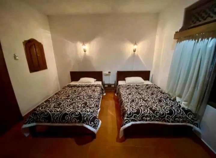 Bed in Puri Bebengan Bungalows