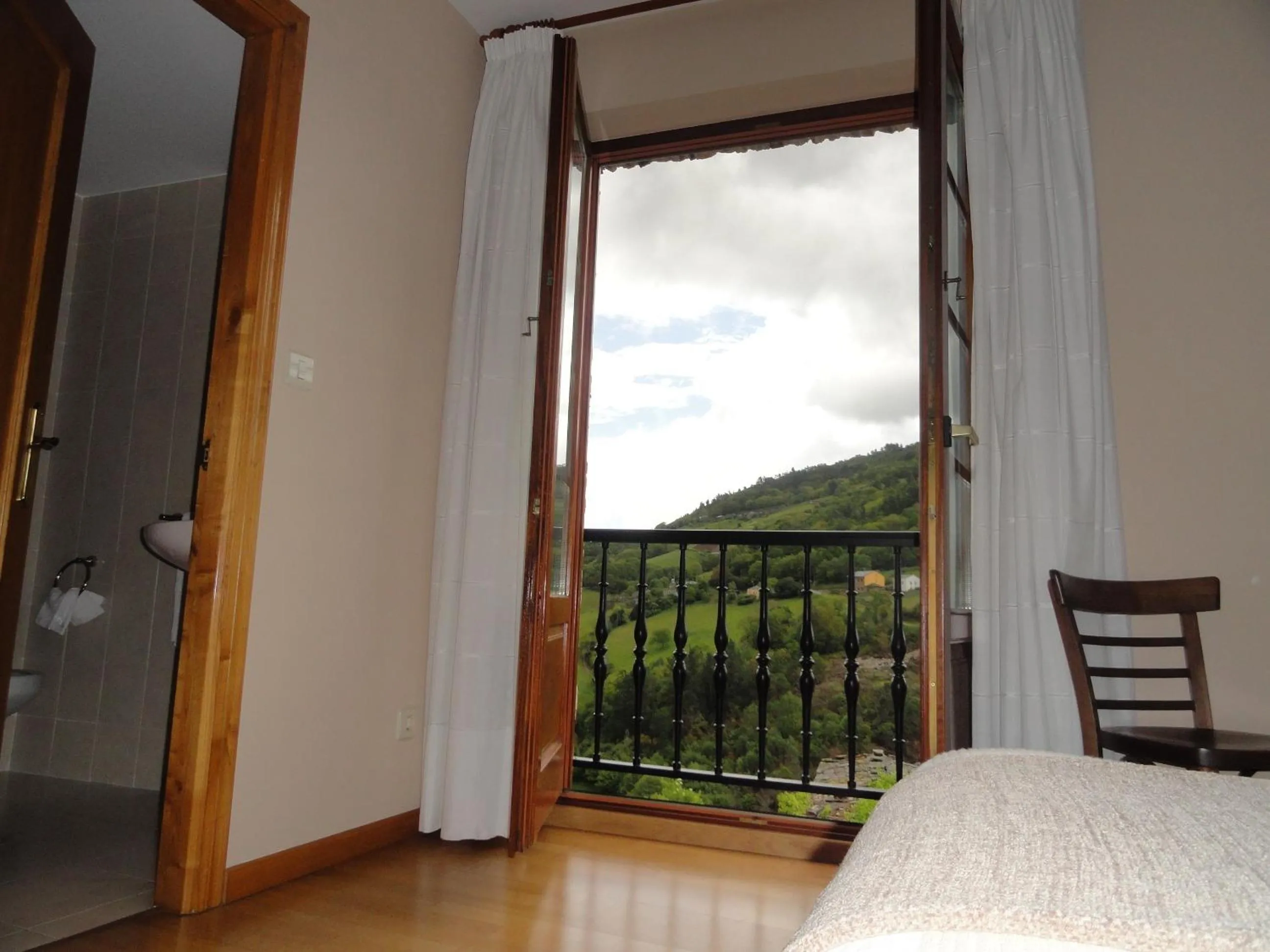 View (from property/room), Bed in Hotel Restaurante Casa Petronila