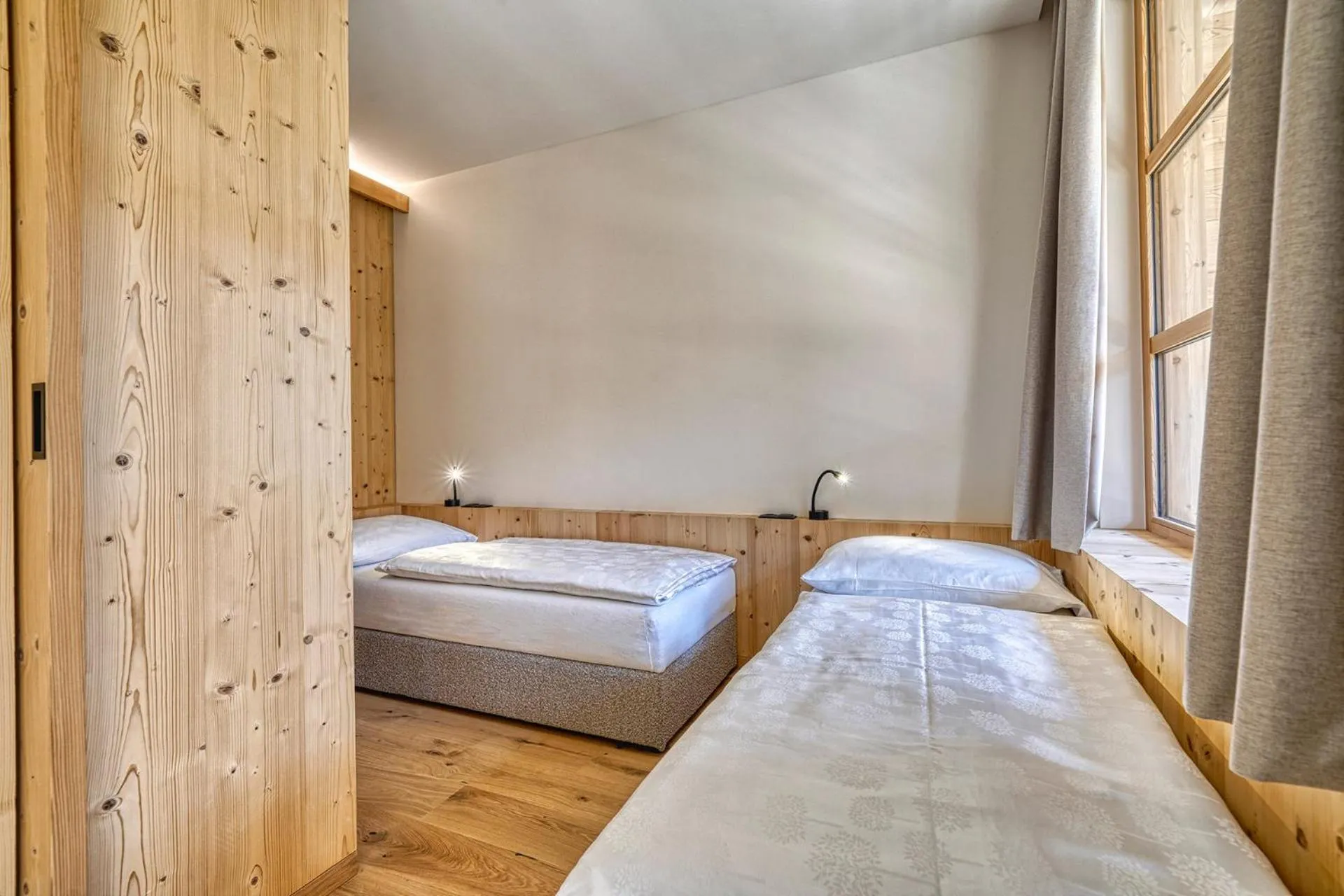 Bed in Hotel Pustertalerhof