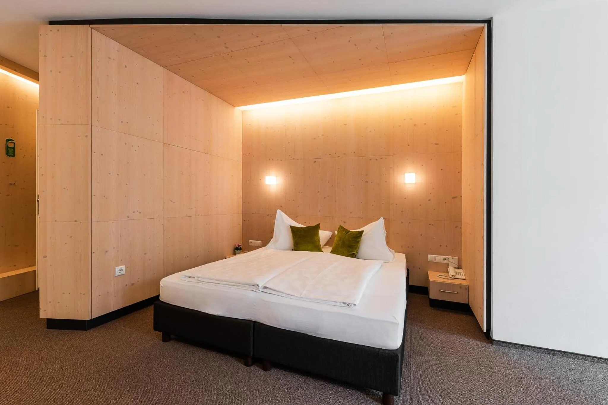 Bed in Hotel Pustertalerhof