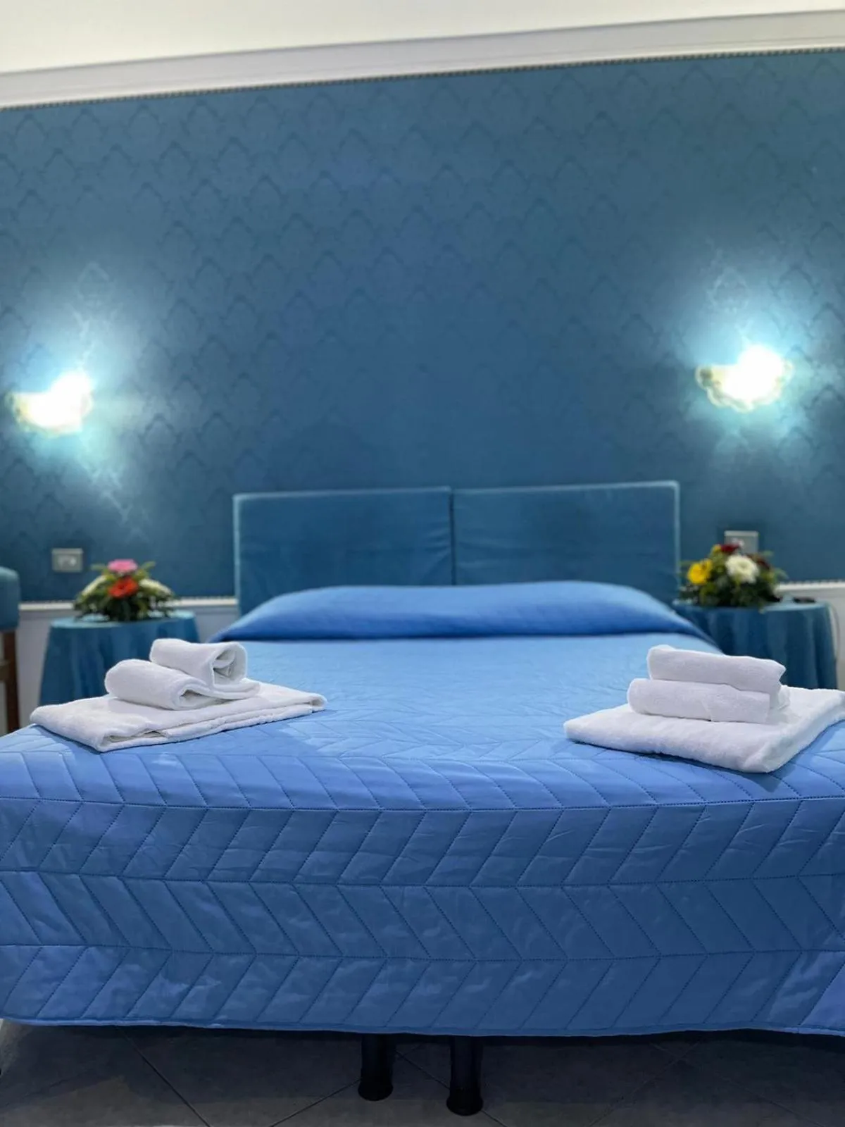 Bed in Hotel Michelangelo