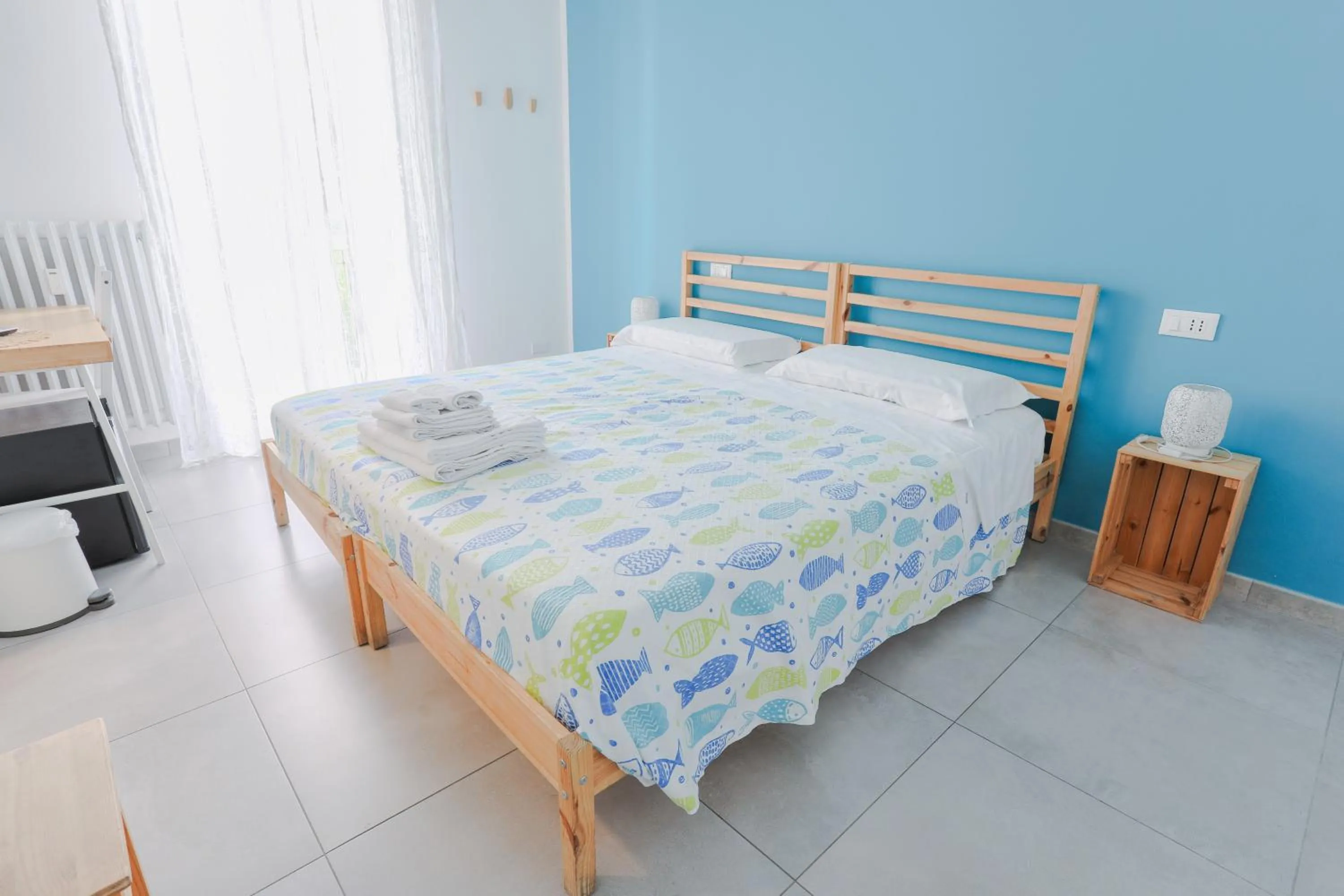 Bed in HOLABOLOGNA Luxury Rooms and Flats