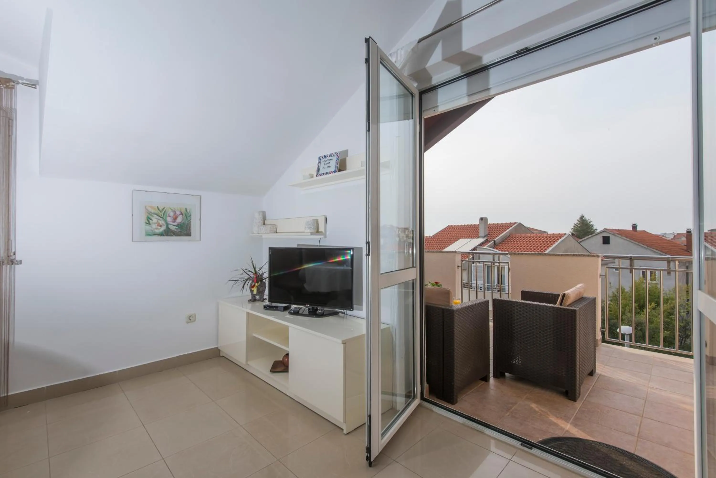 Communal lounge/ TV room in Apartments Batur