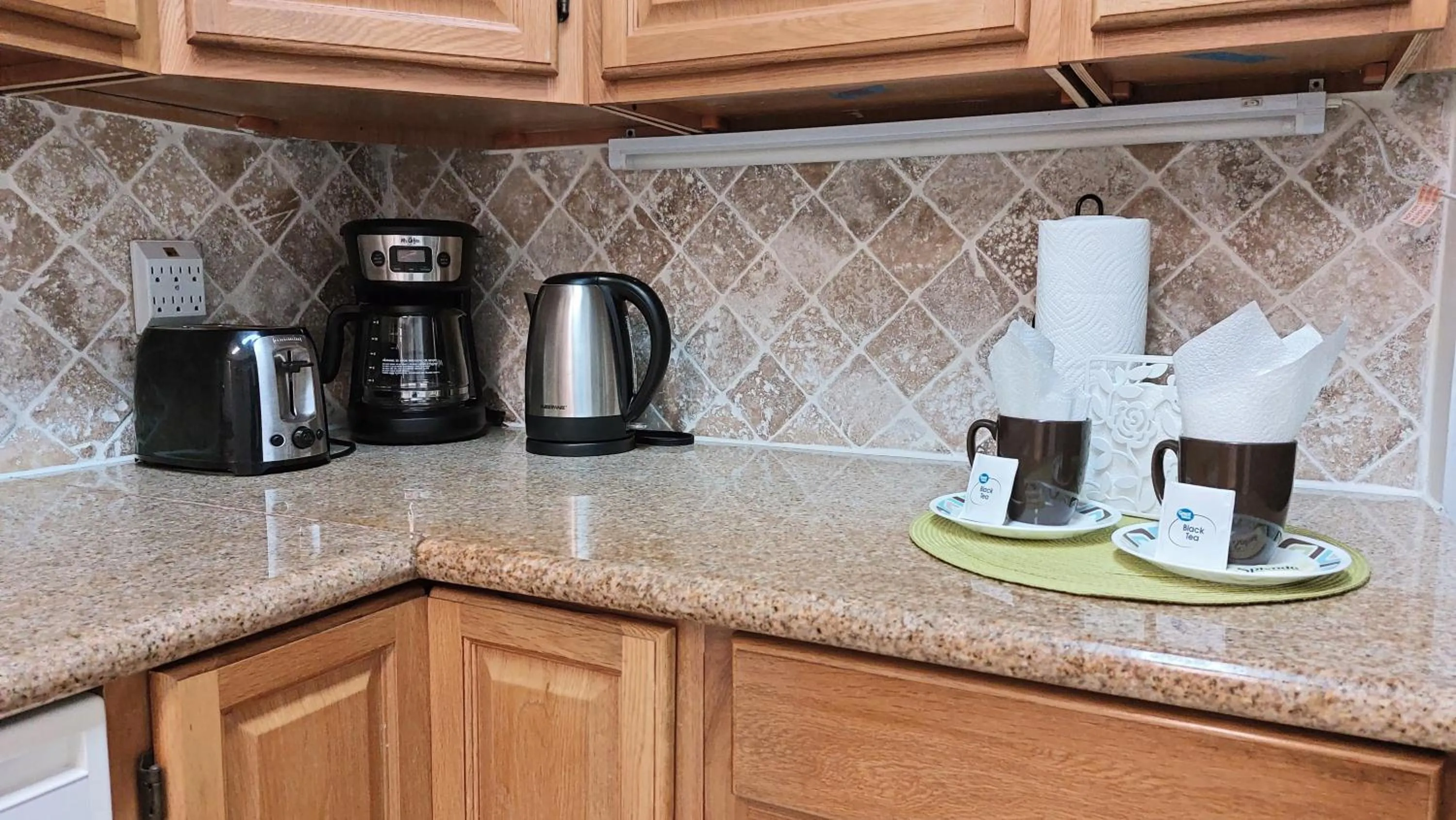 Kitchen or kitchenette in The Tides Apartments on the beach