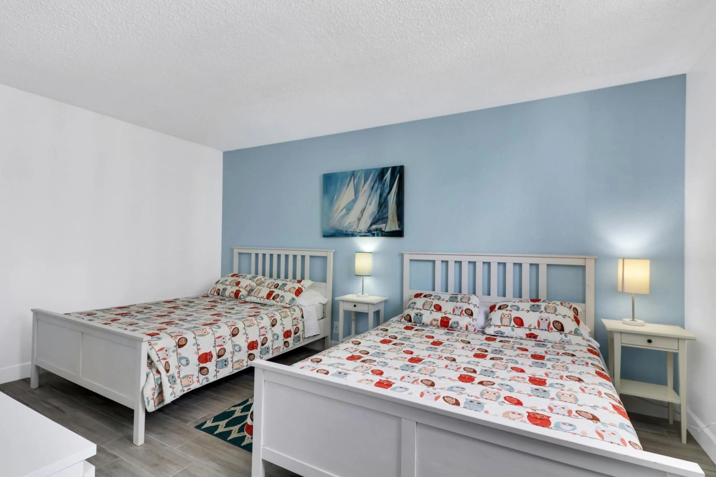 Bedroom, Bed in The Tides Apartments on the beach