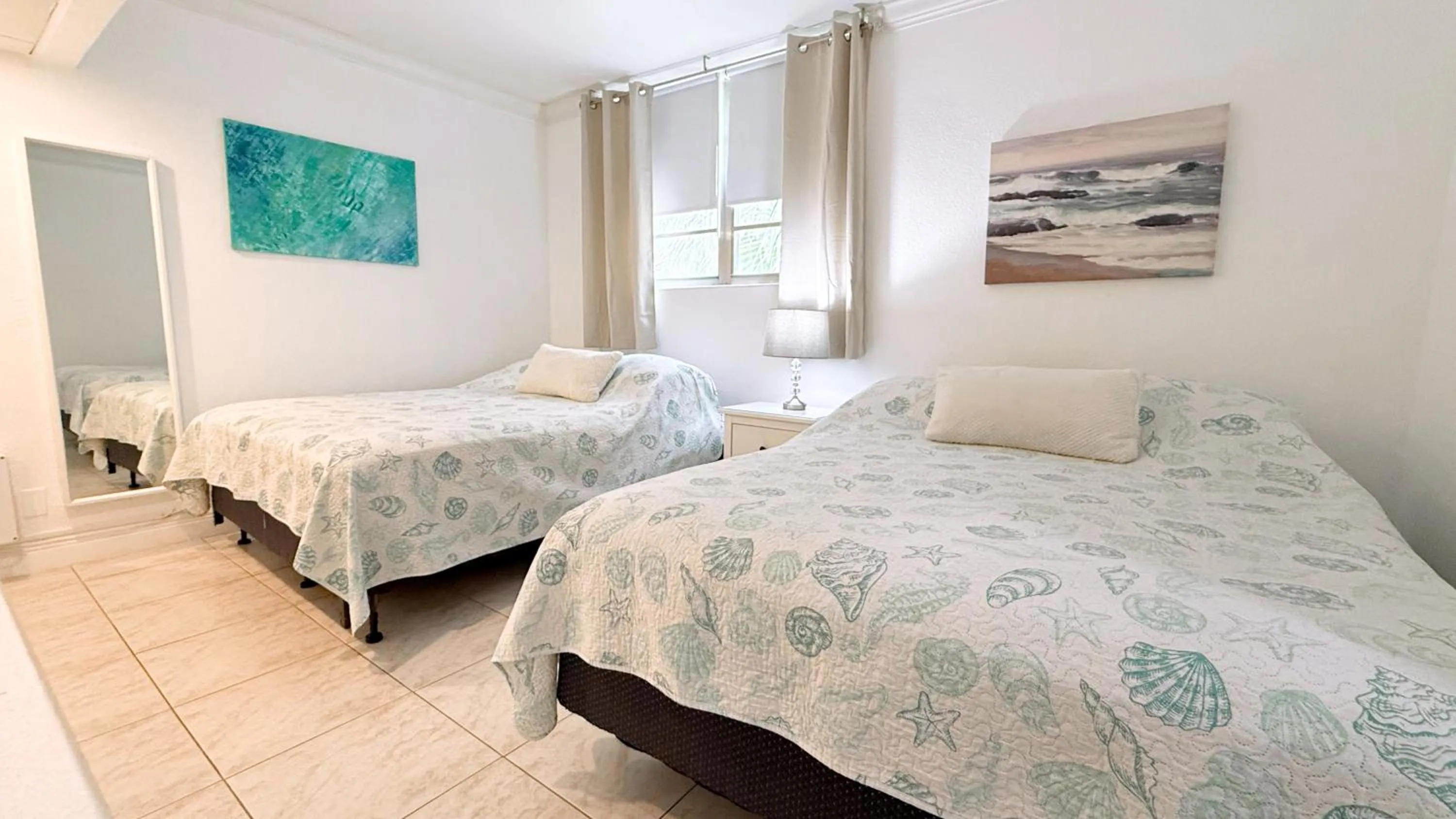 Bedroom, Bed in The Tides Apartments on the beach