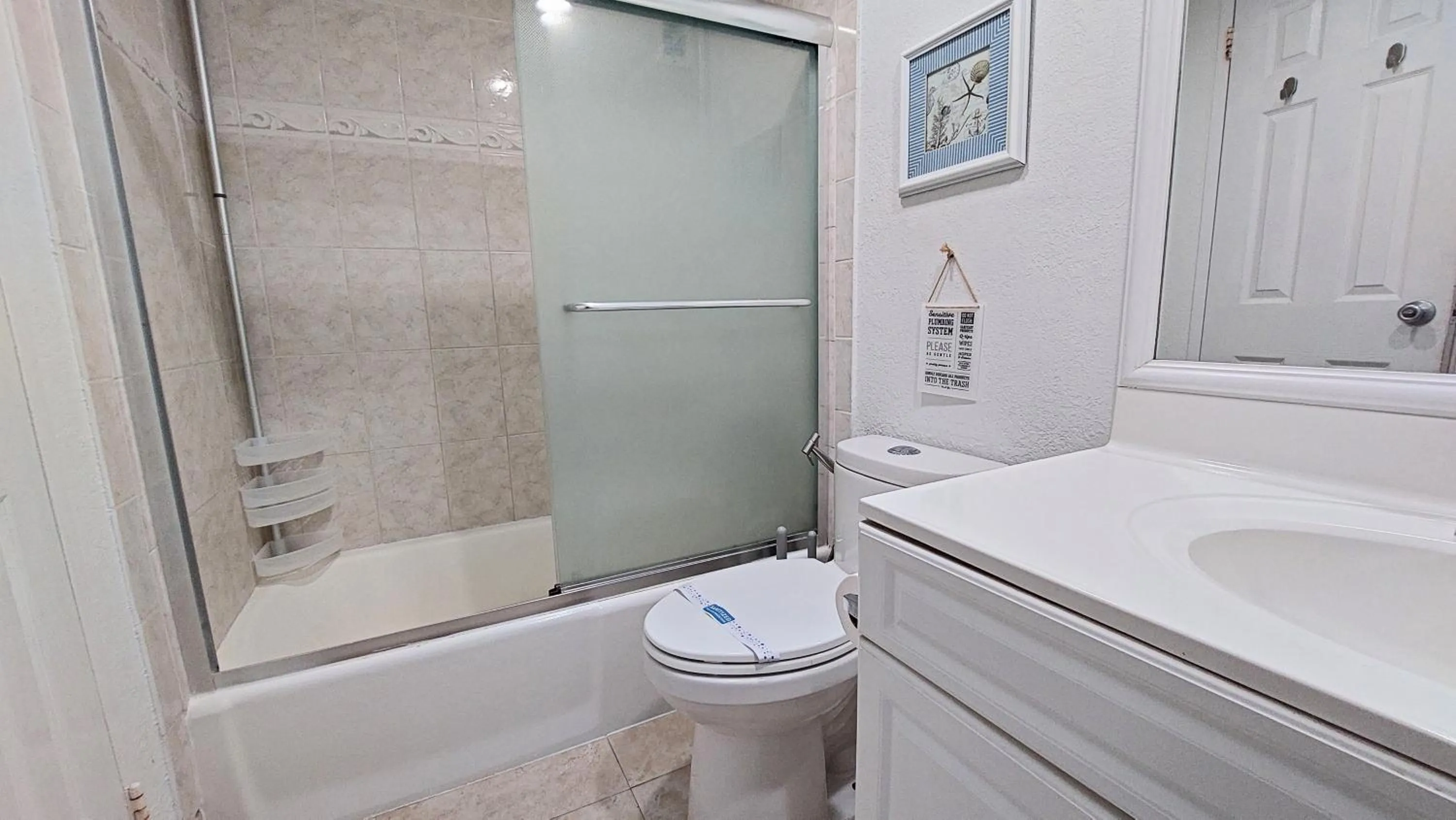 Bathroom in The Tides Apartments on the beach