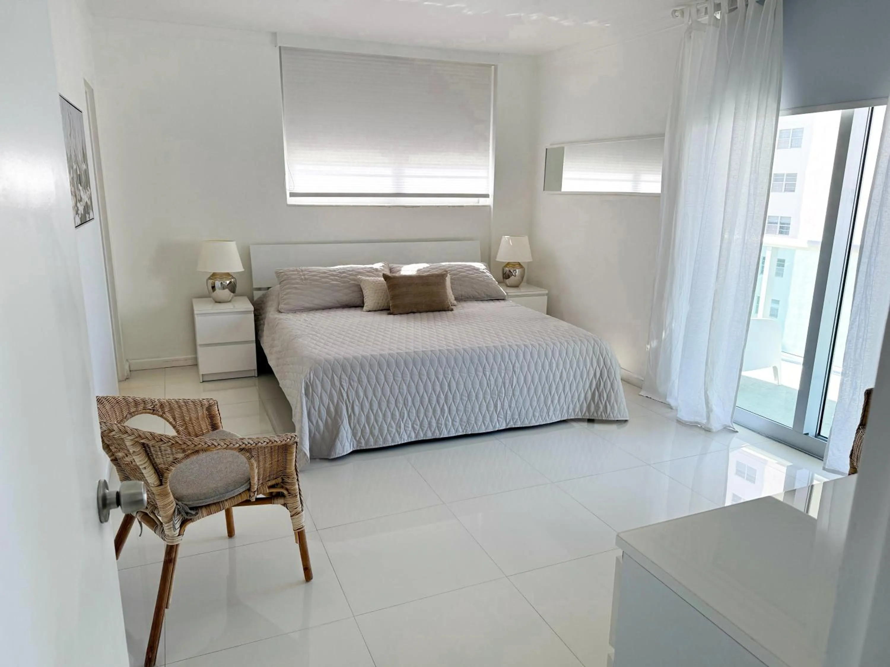 Bedroom, Bed in The Tides Apartments on the beach