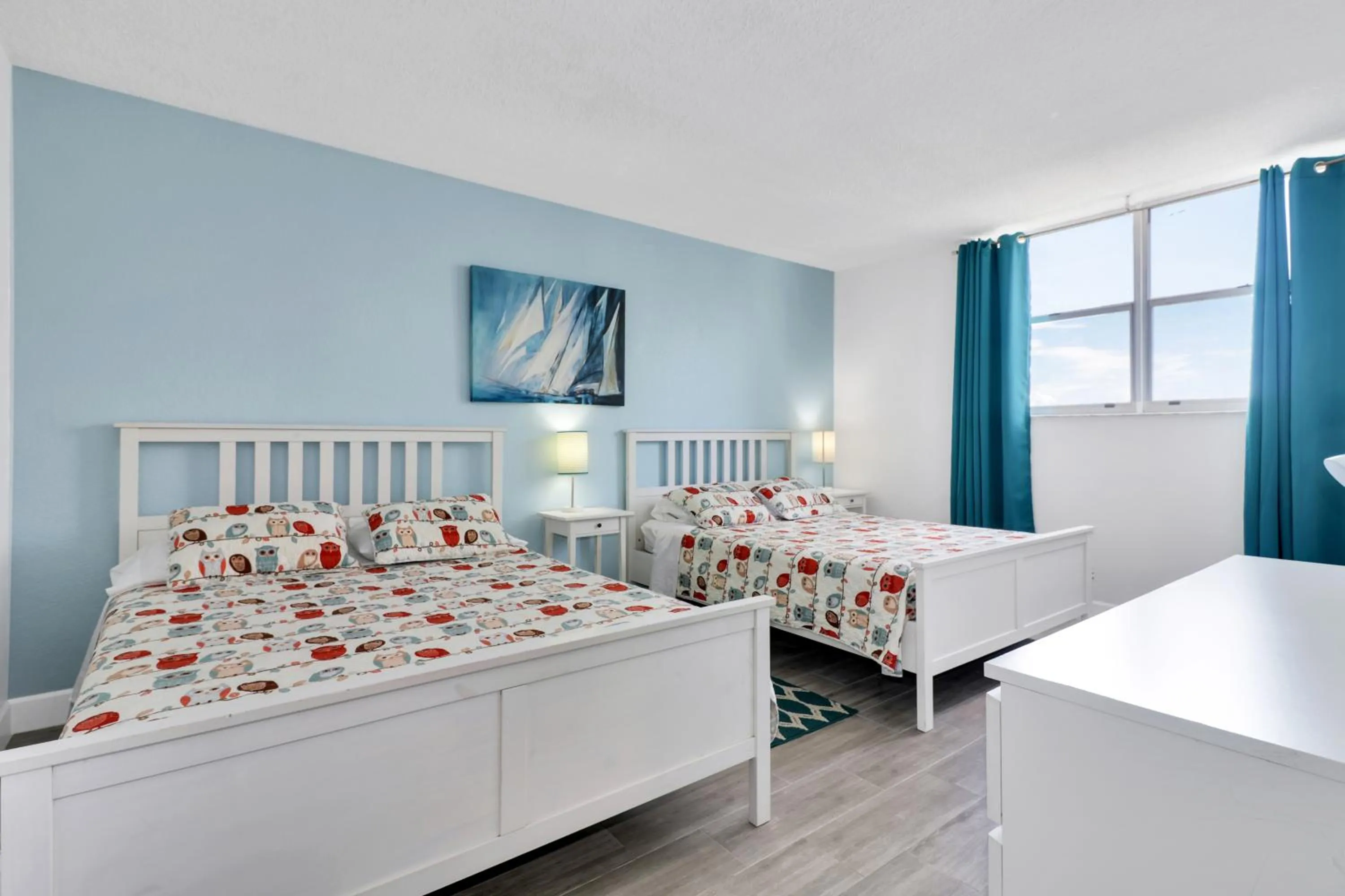 Bedroom, Bed in The Tides Apartments on the beach