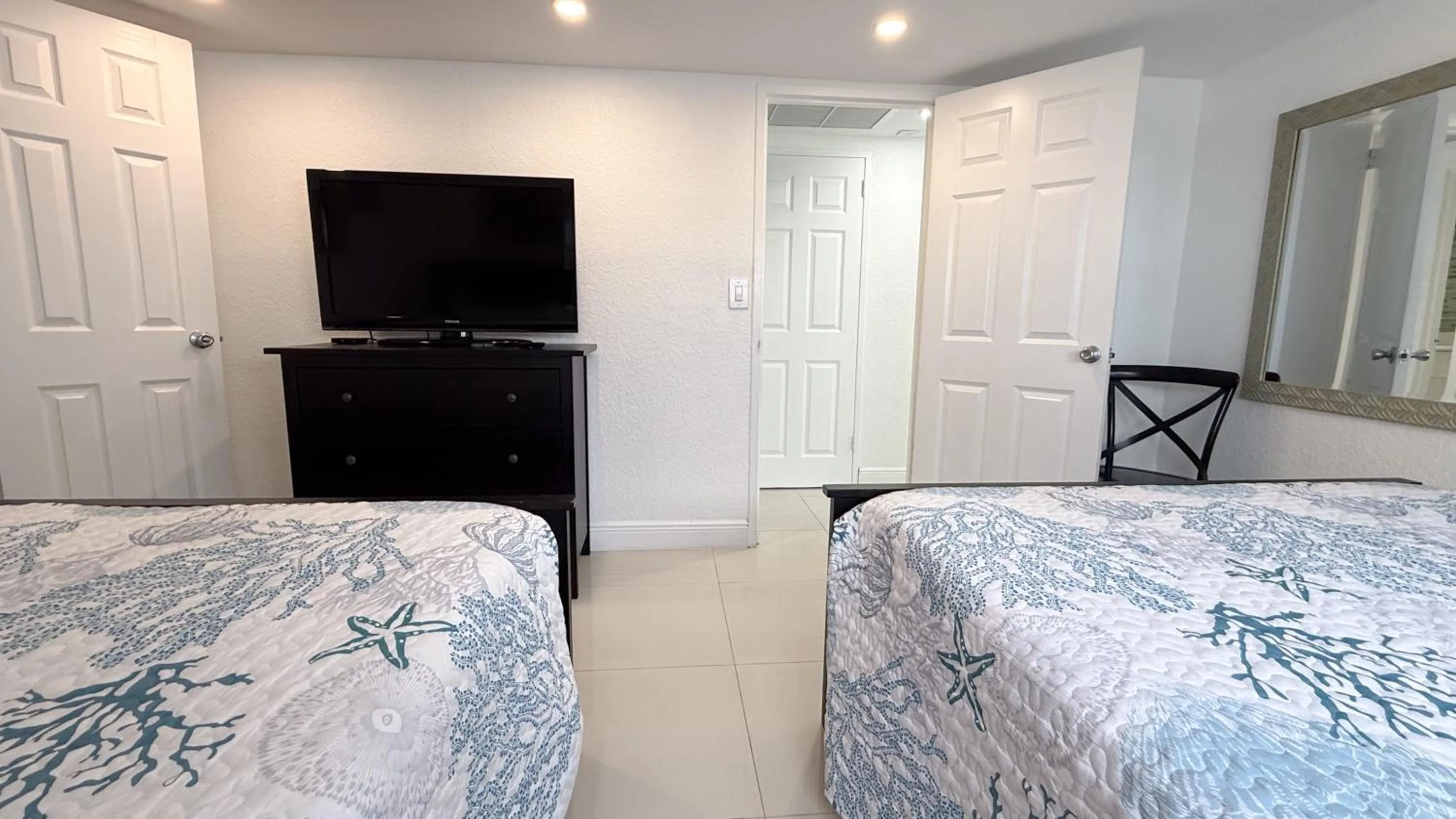 Bedroom, Bed in The Tides Apartments on the beach