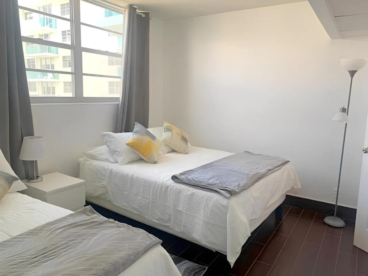 Bedroom, Bed in The Tides Apartments on the beach