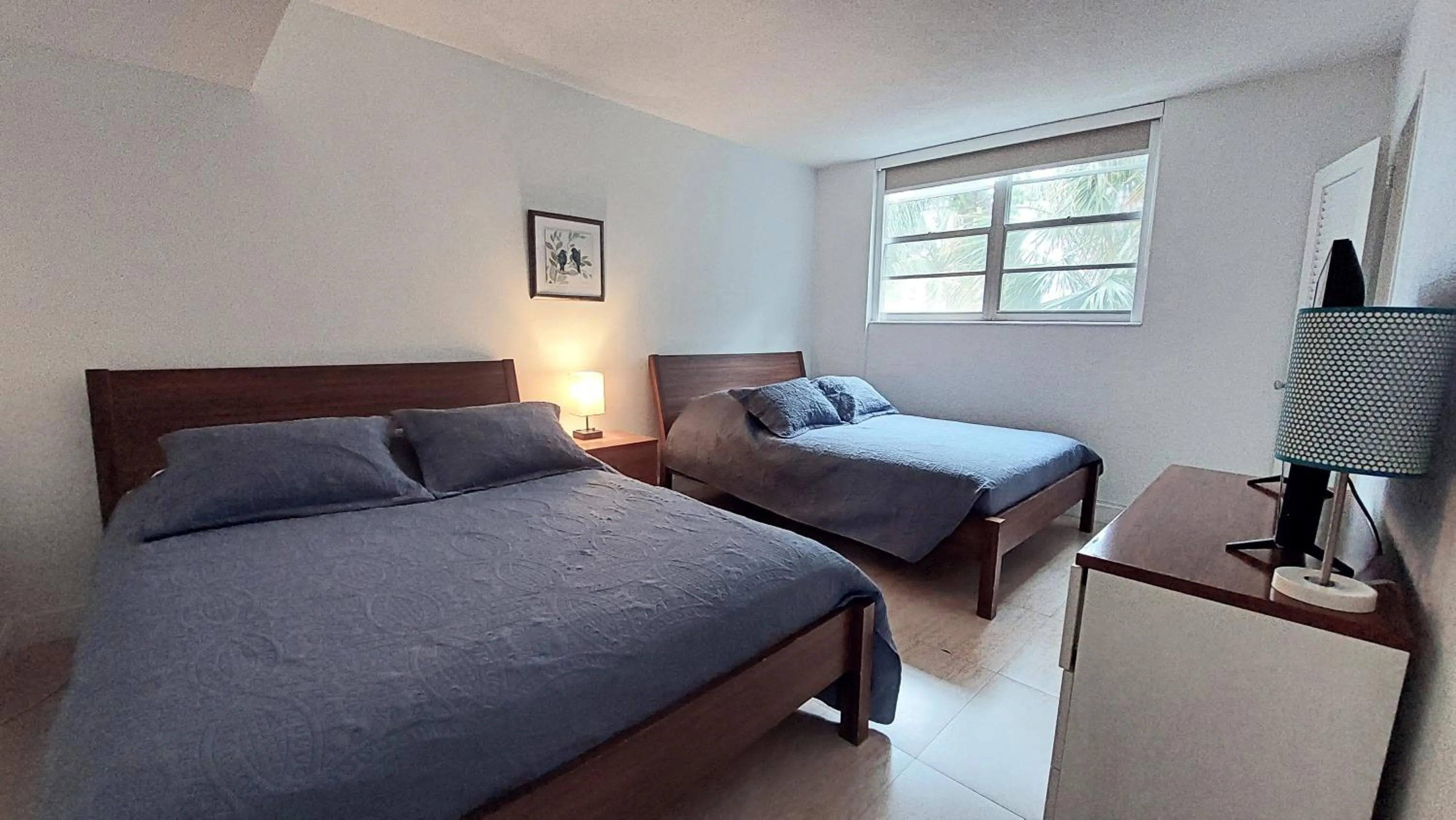 Bedroom, Bed in The Tides Apartments on the beach