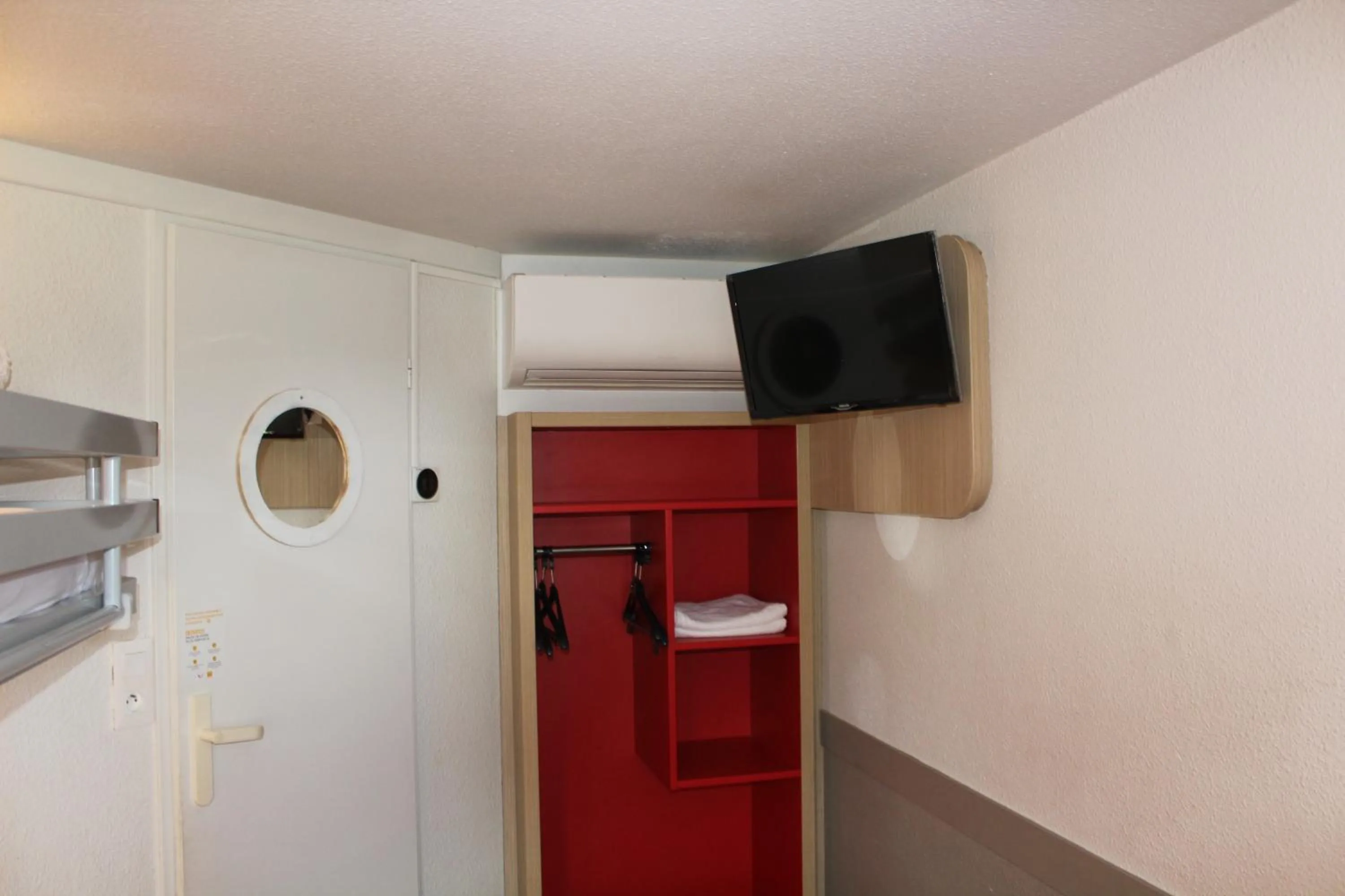 TV and multimedia in Premiere Classe St Quentin en Yvelines Elancourt