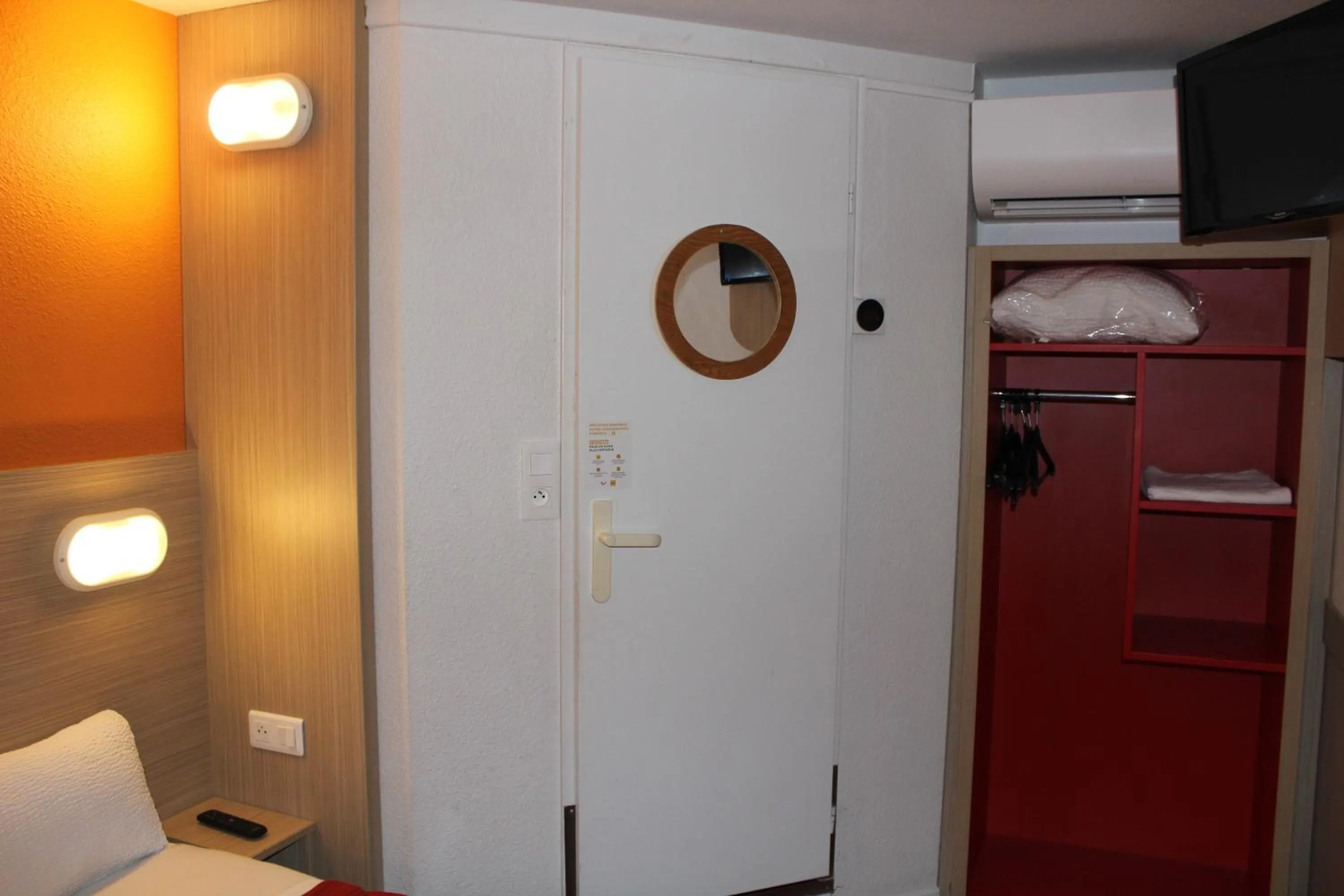 TV and multimedia in Premiere Classe St Quentin en Yvelines Elancourt