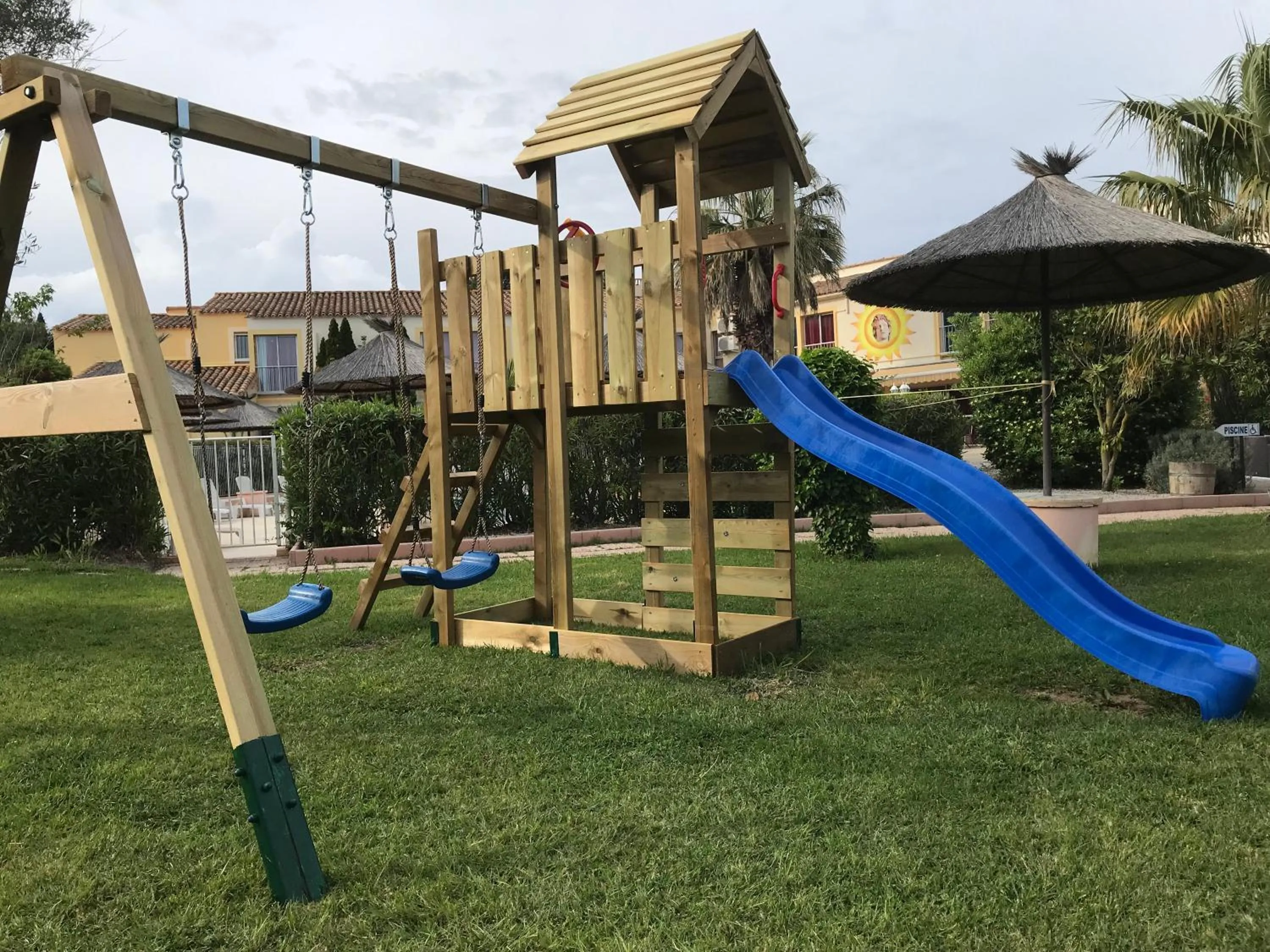 Children play ground in Brit Hotel Confort Hélios Agde