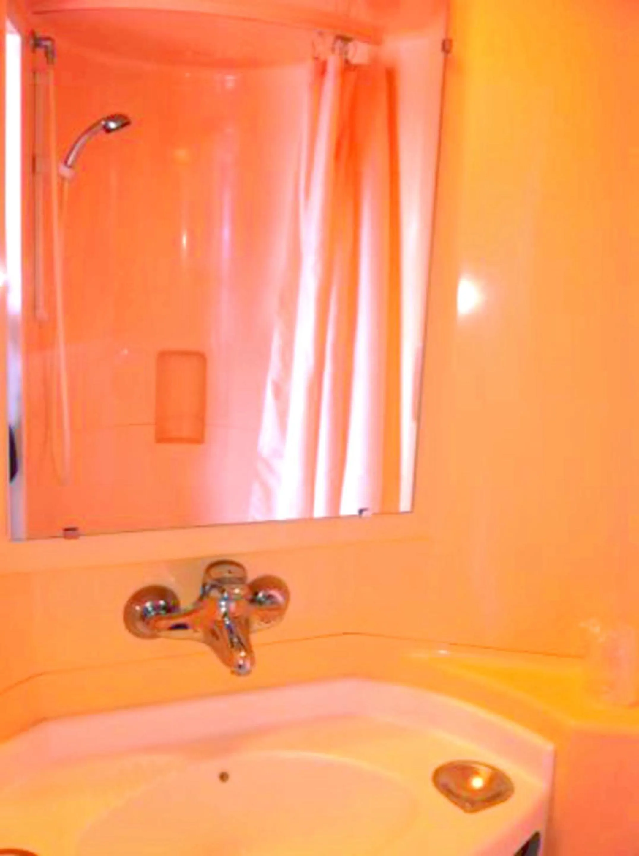 Bathroom in Premiere Classe Paris Ouest - Nanterre - La Defense