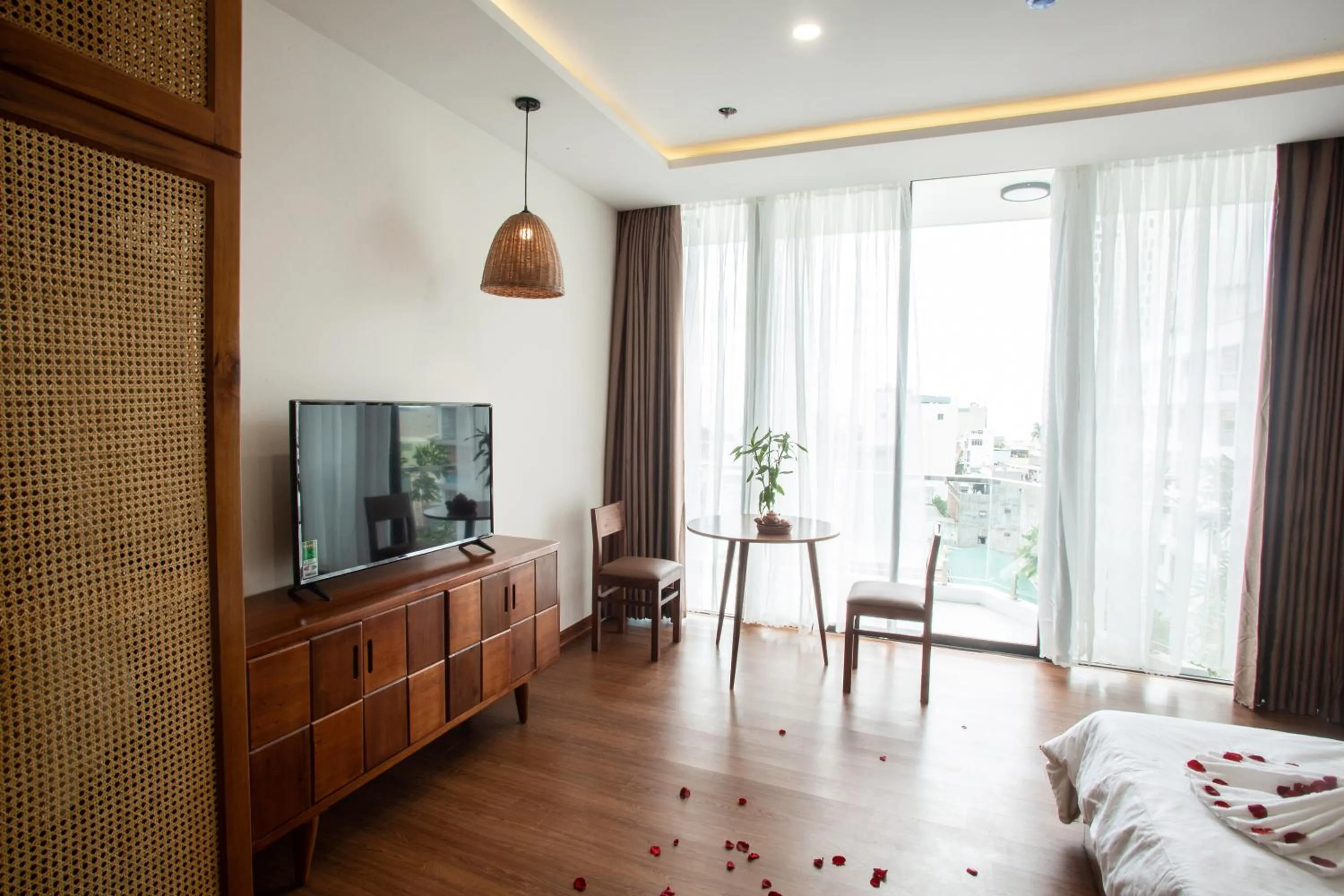 Communal lounge/ TV room, Bed in Luu Ngai Condotel Quy Nhon