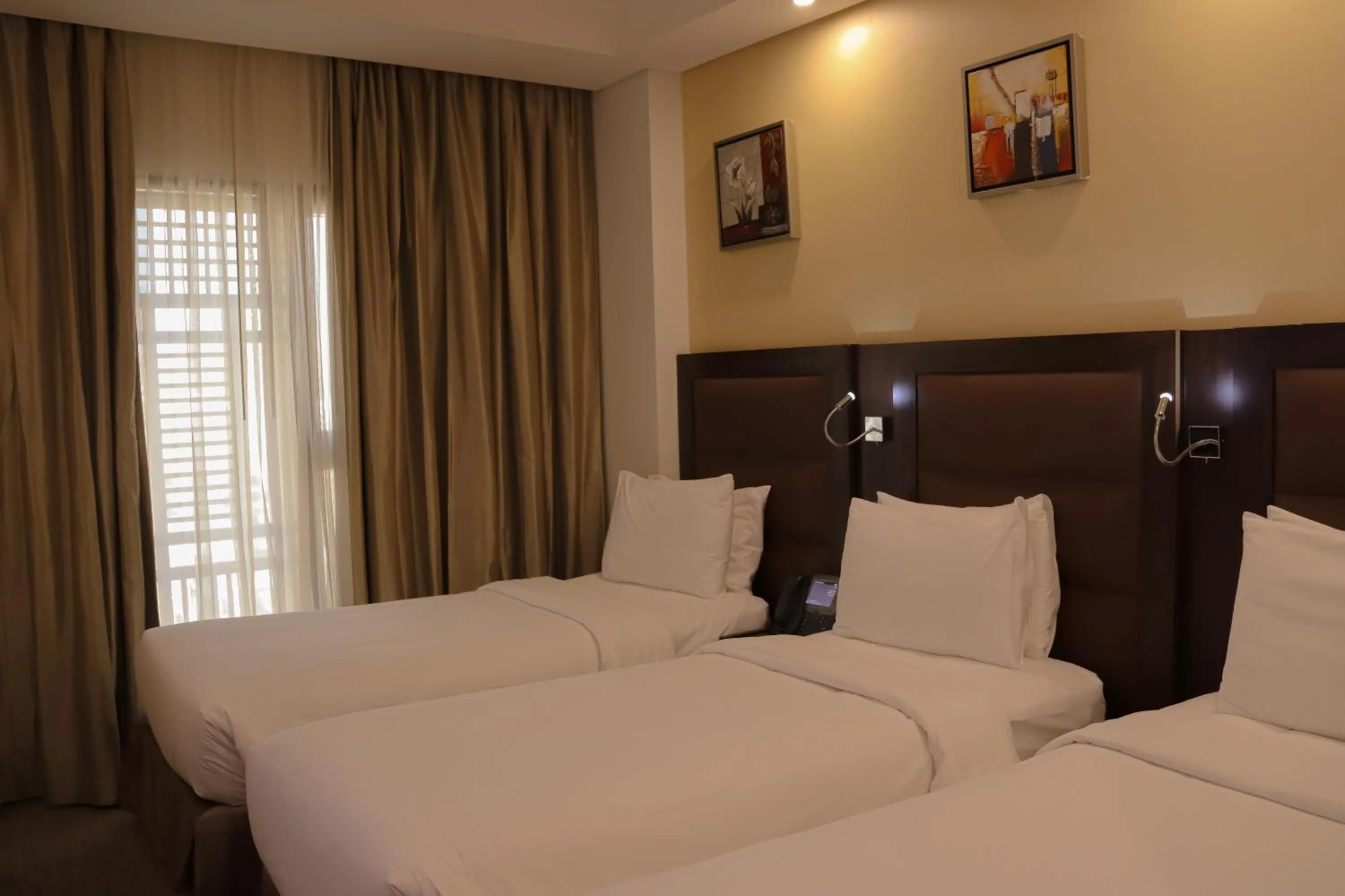 Bedroom, Bed in Crowne Plaza Madinah by IHG