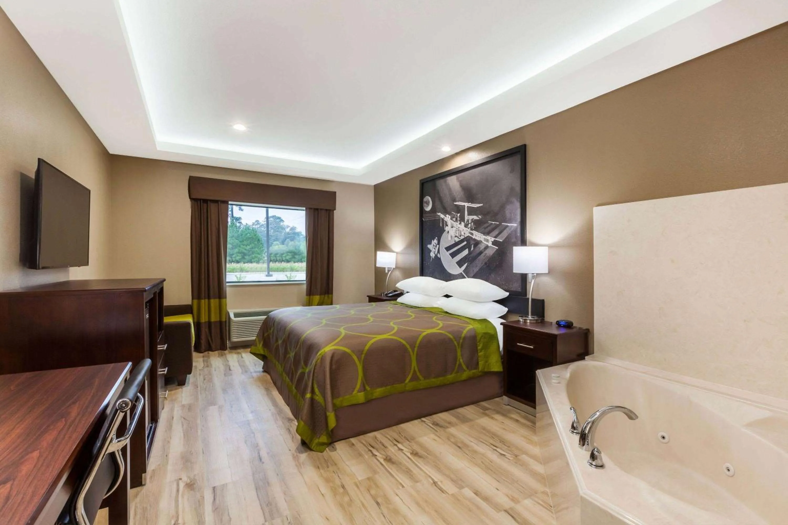 Bed in Super 8 by Wyndham Kingwood Houston North