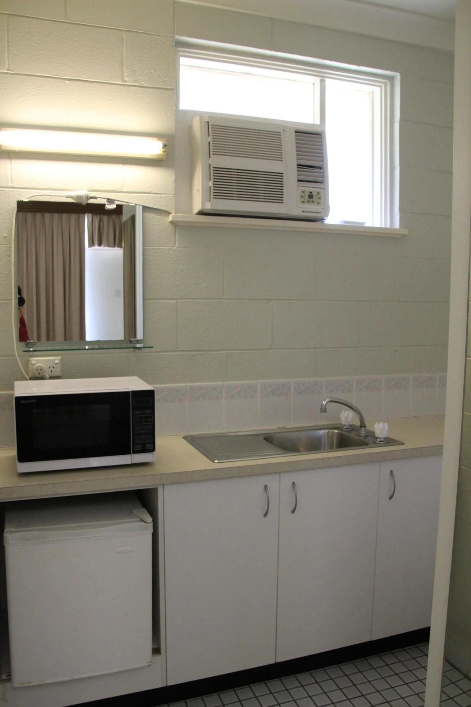 Kitchen or kitchenette in Central Coast Motel