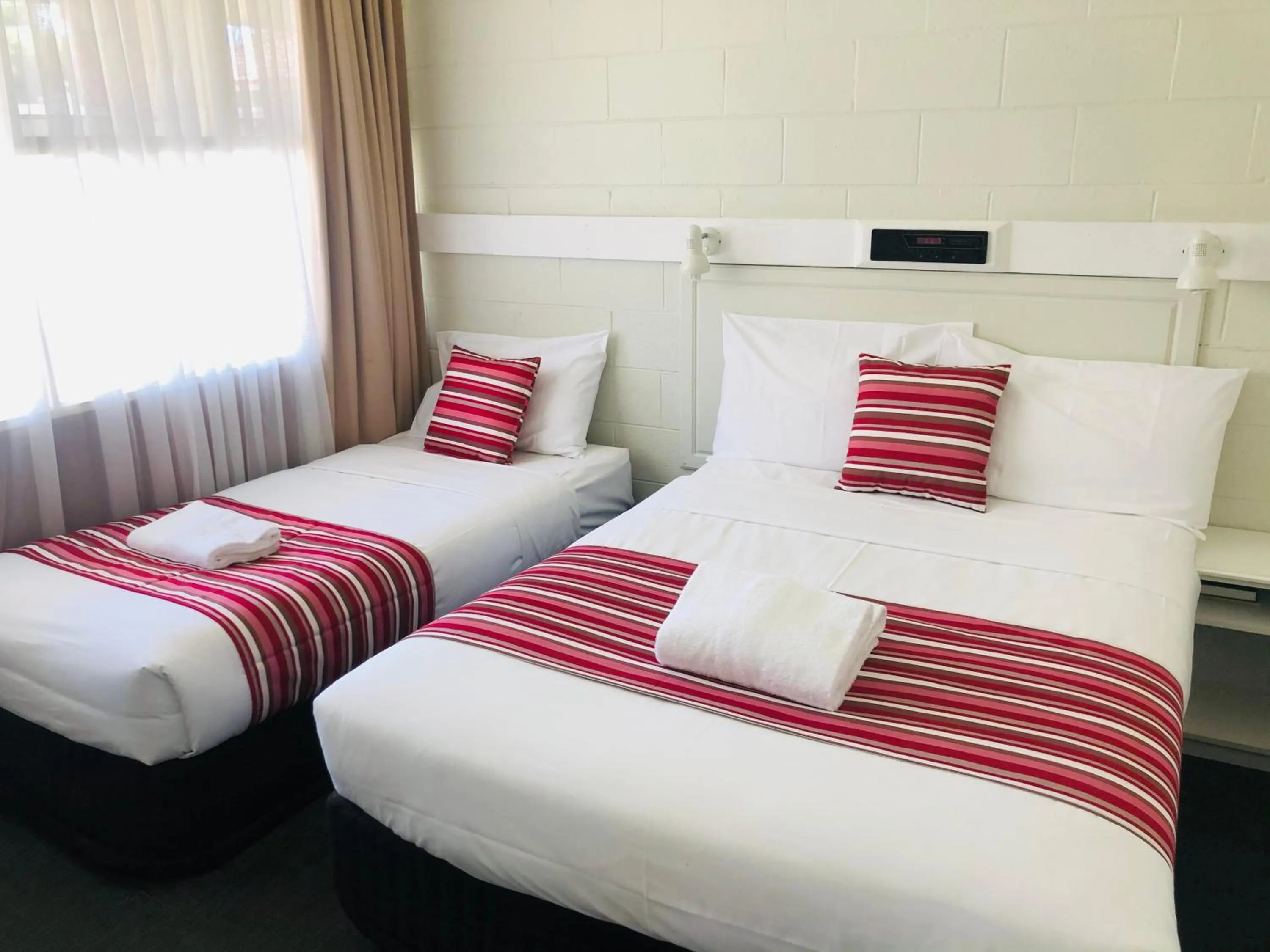 Bed in Central Coast Motel