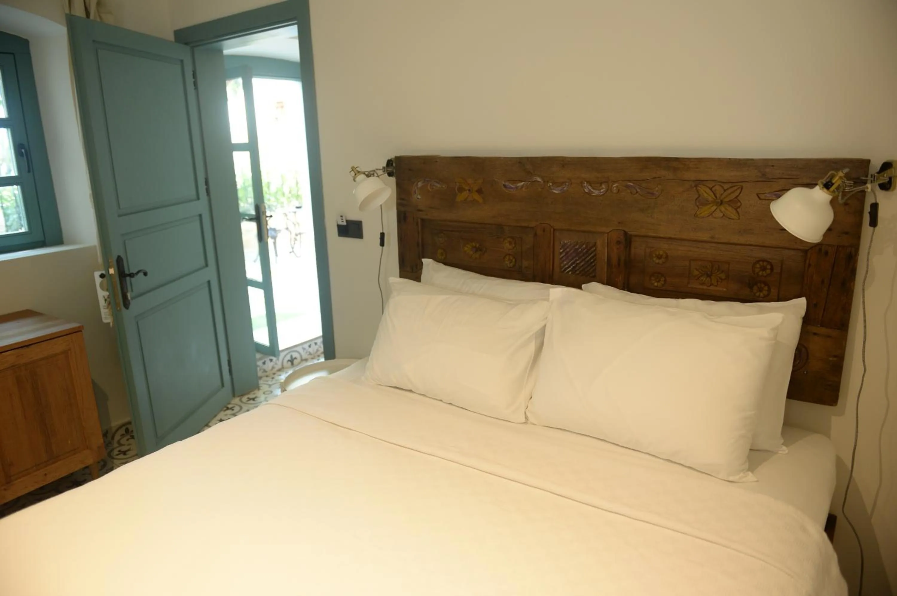Bed in Oalis Boutique Hotel