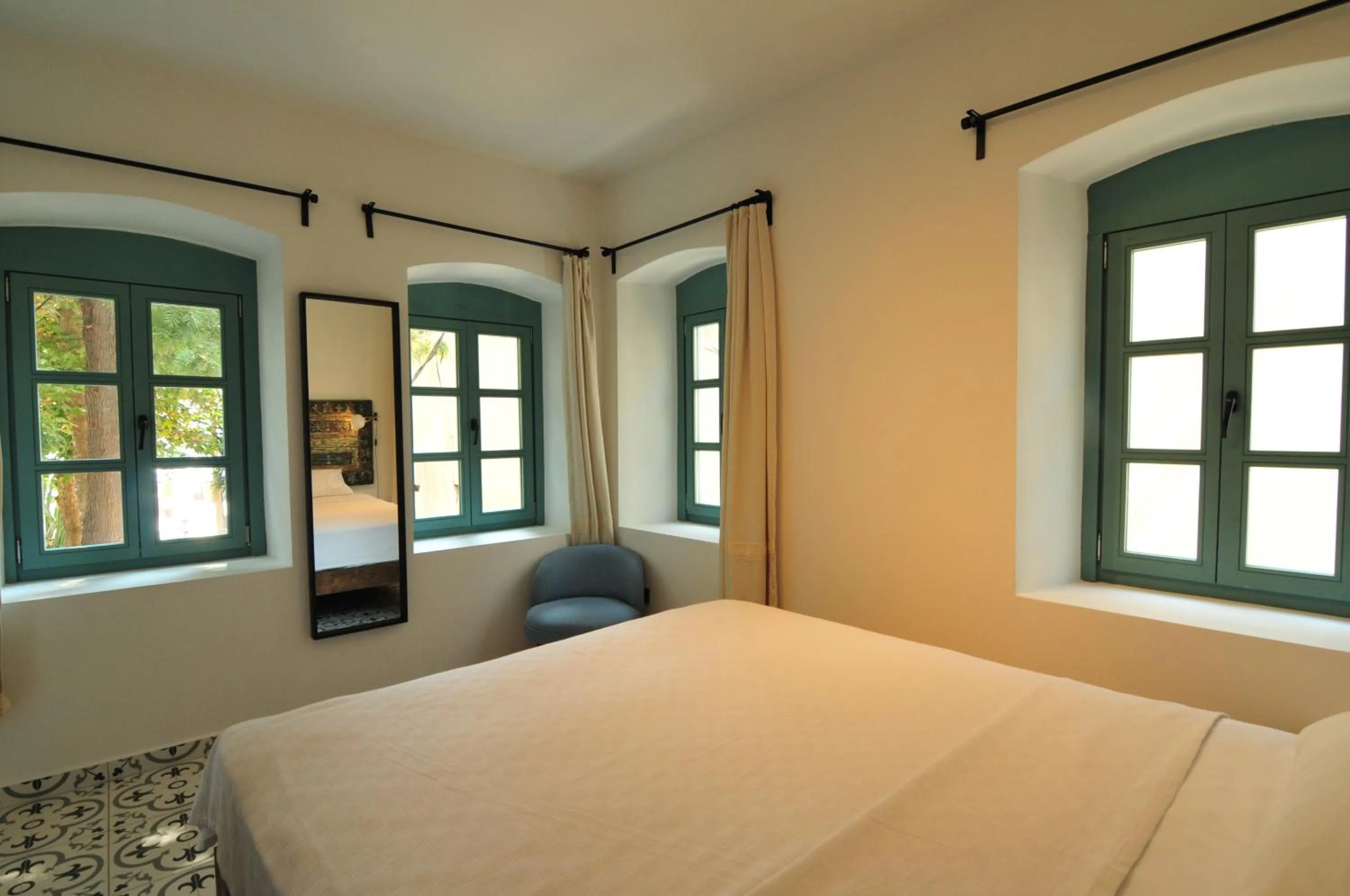 Bed in Oalis Boutique Hotel