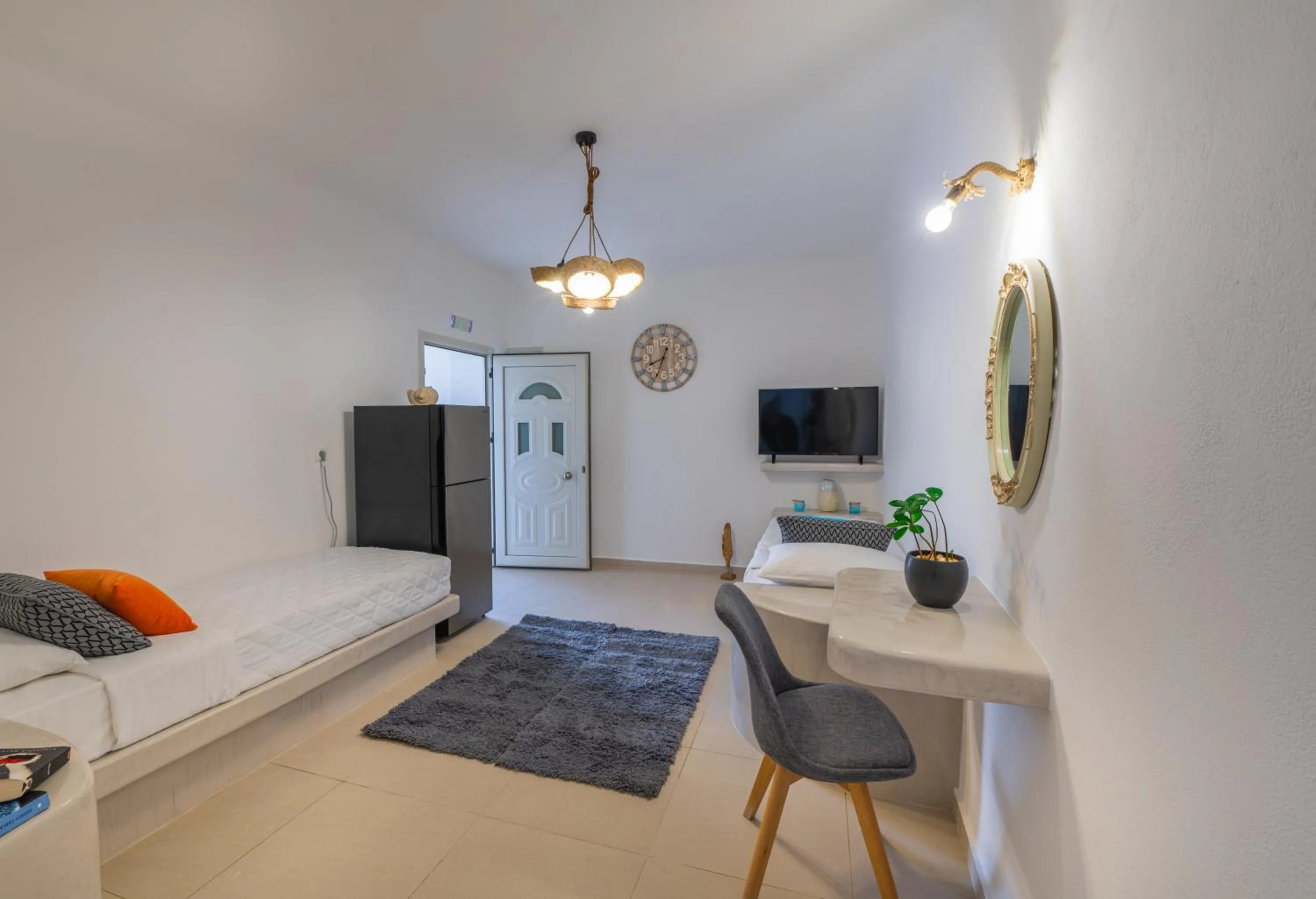 Bed in Santoterra Antigua Suites