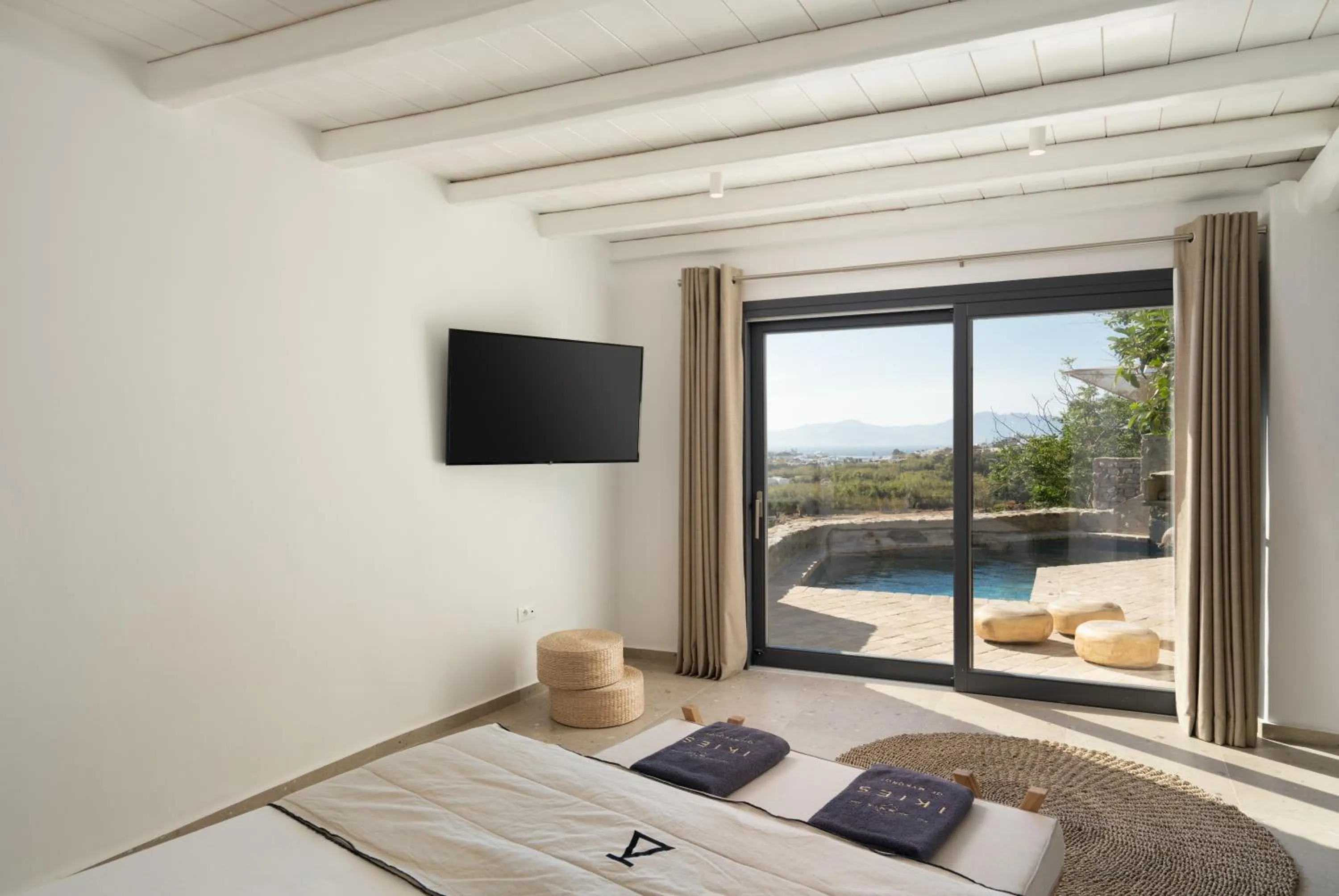 Pool view, Bed in Ikies of Mykonos