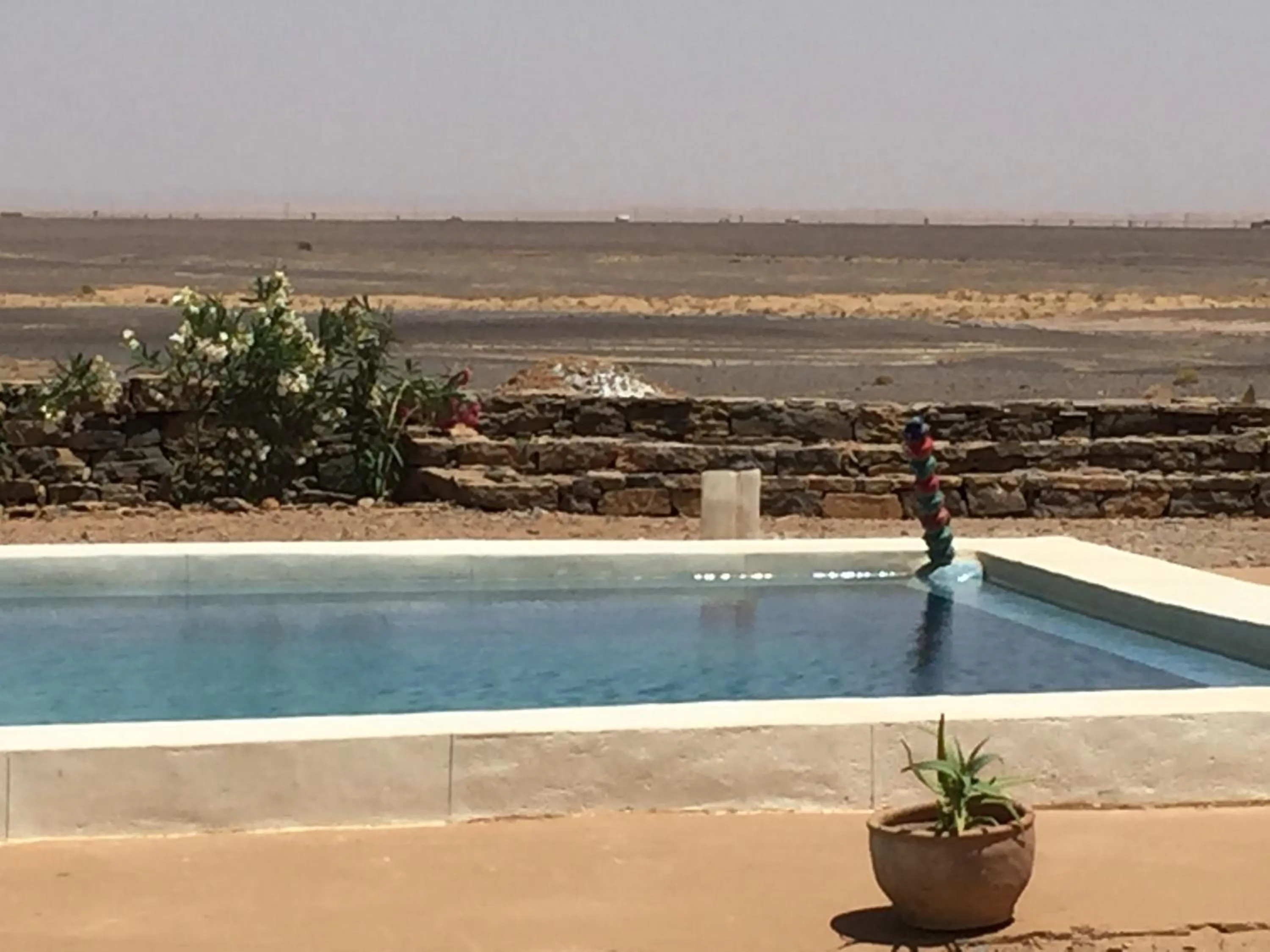 Swimming pool in Maison Boutchrafine