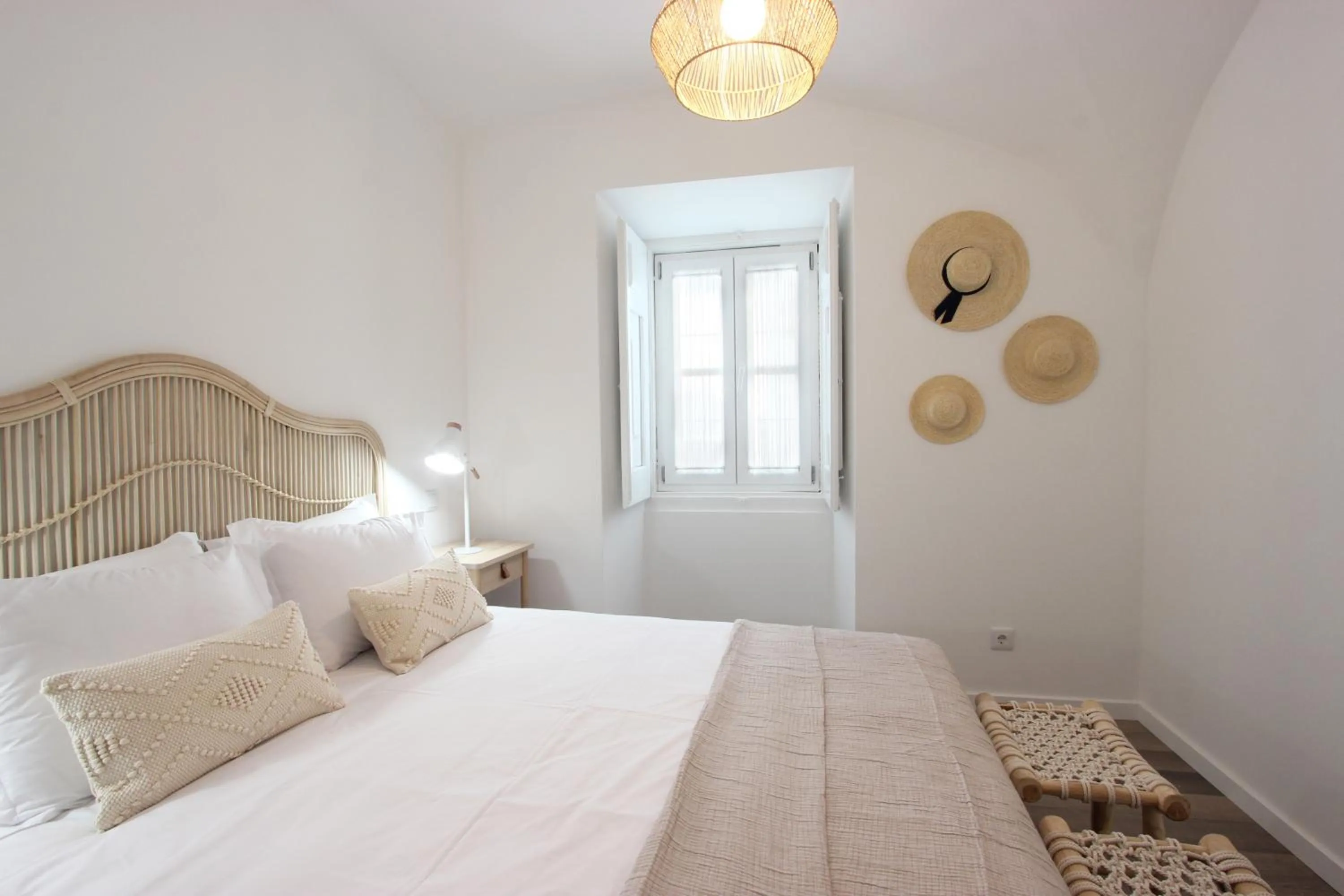 Bed in Lavradores Boutique Guesthouse