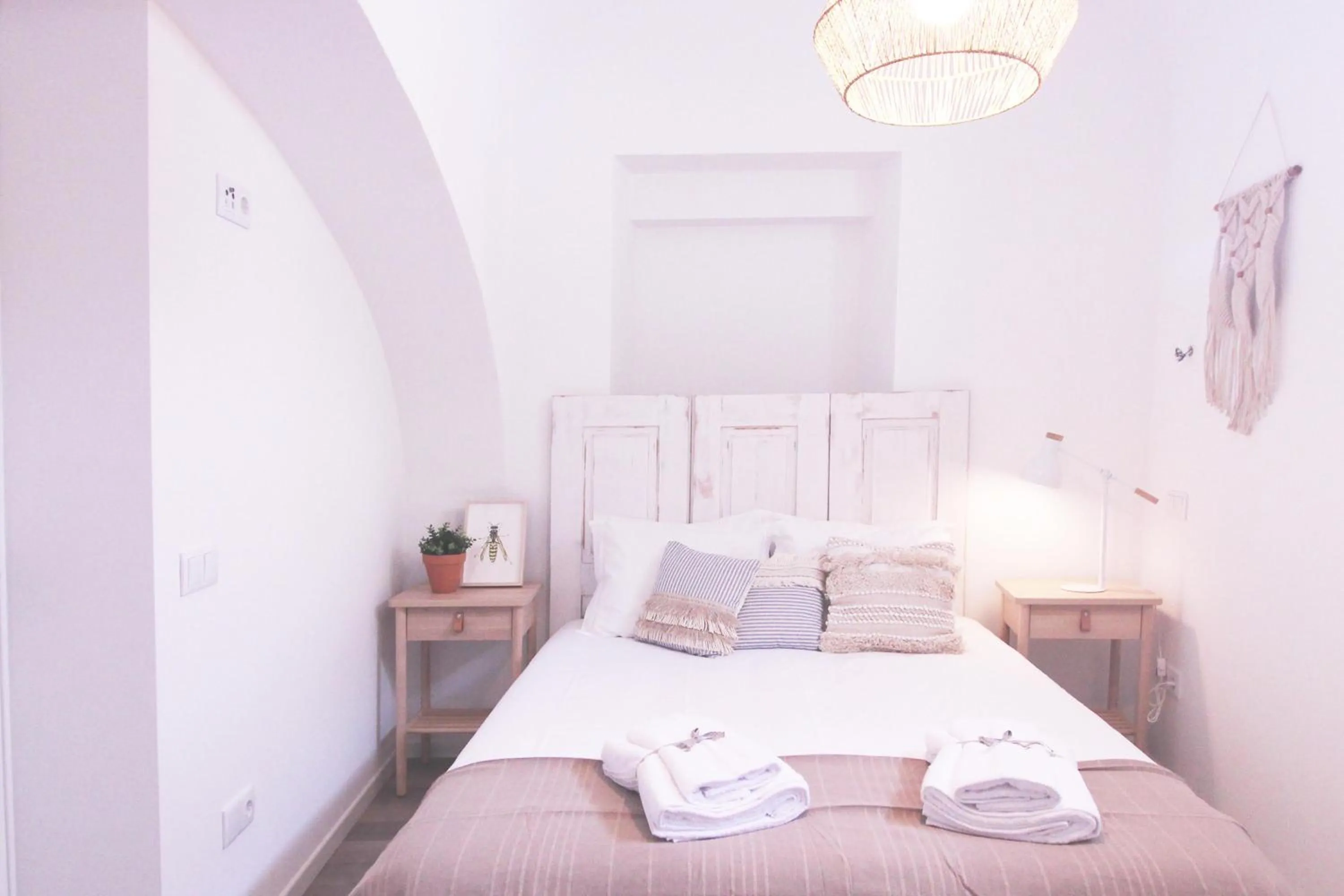 Bed in Lavradores Boutique Guesthouse