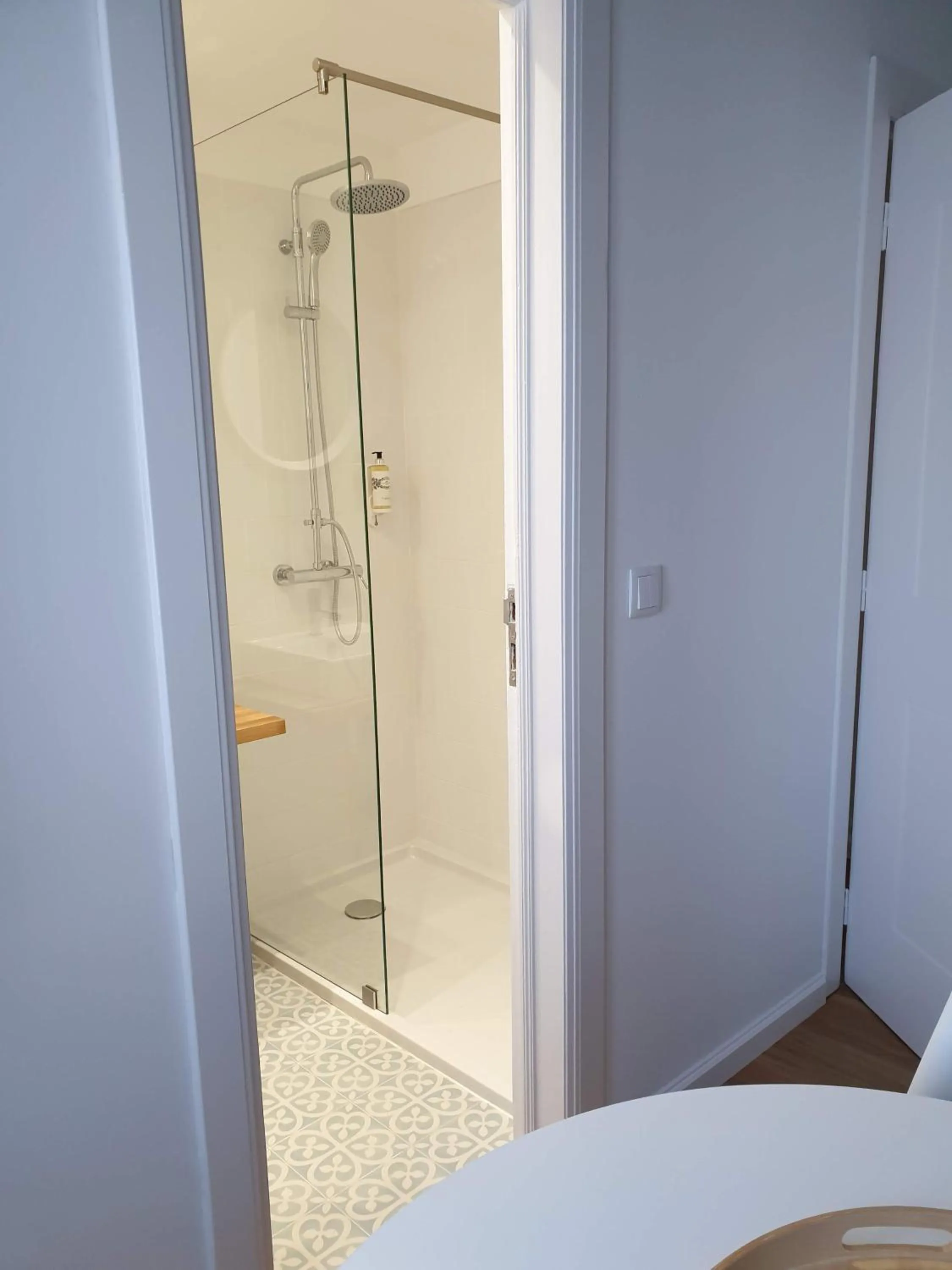 Shower in Lavradores Boutique Guesthouse