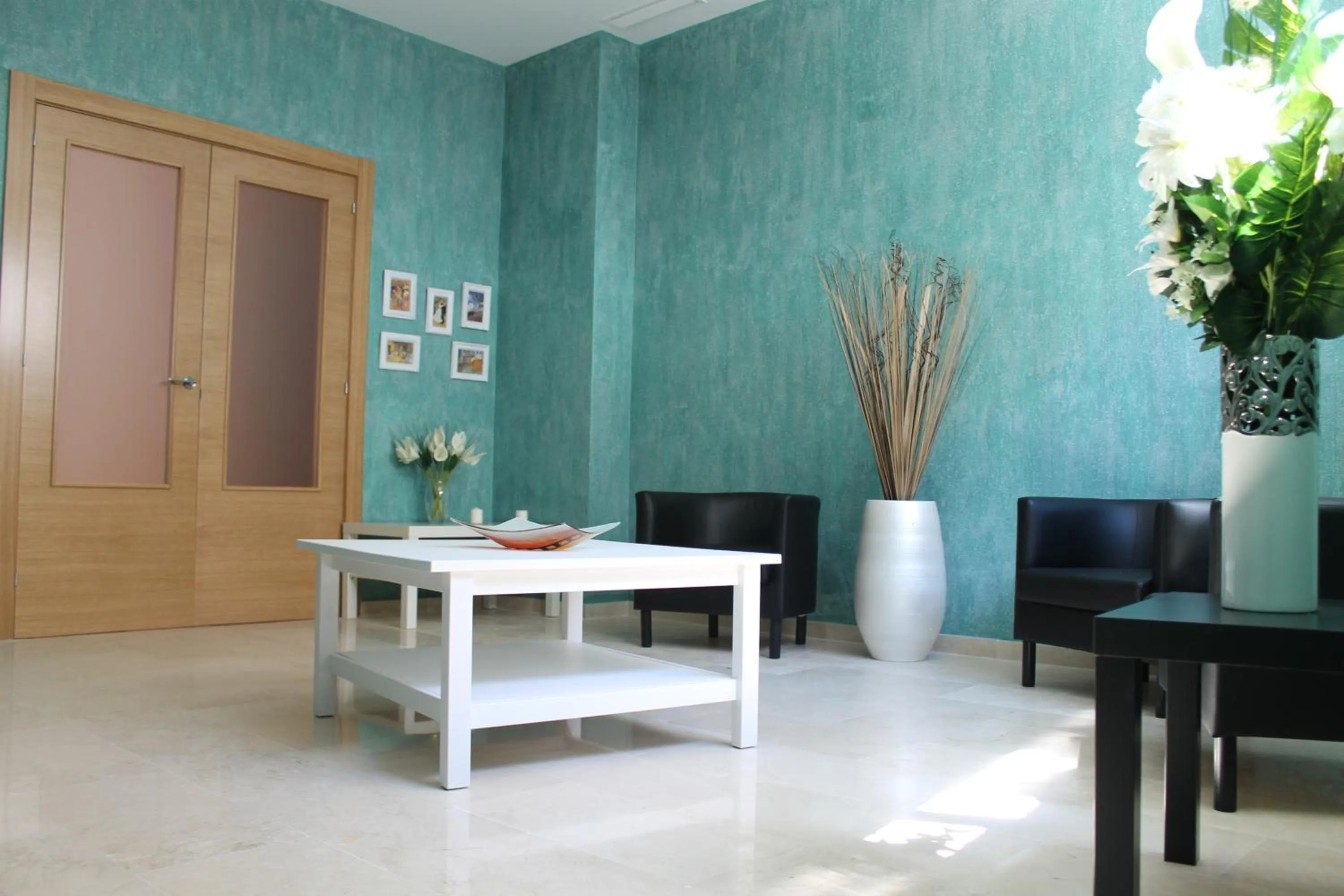 Communal lounge/ TV room in Hotel Carmen