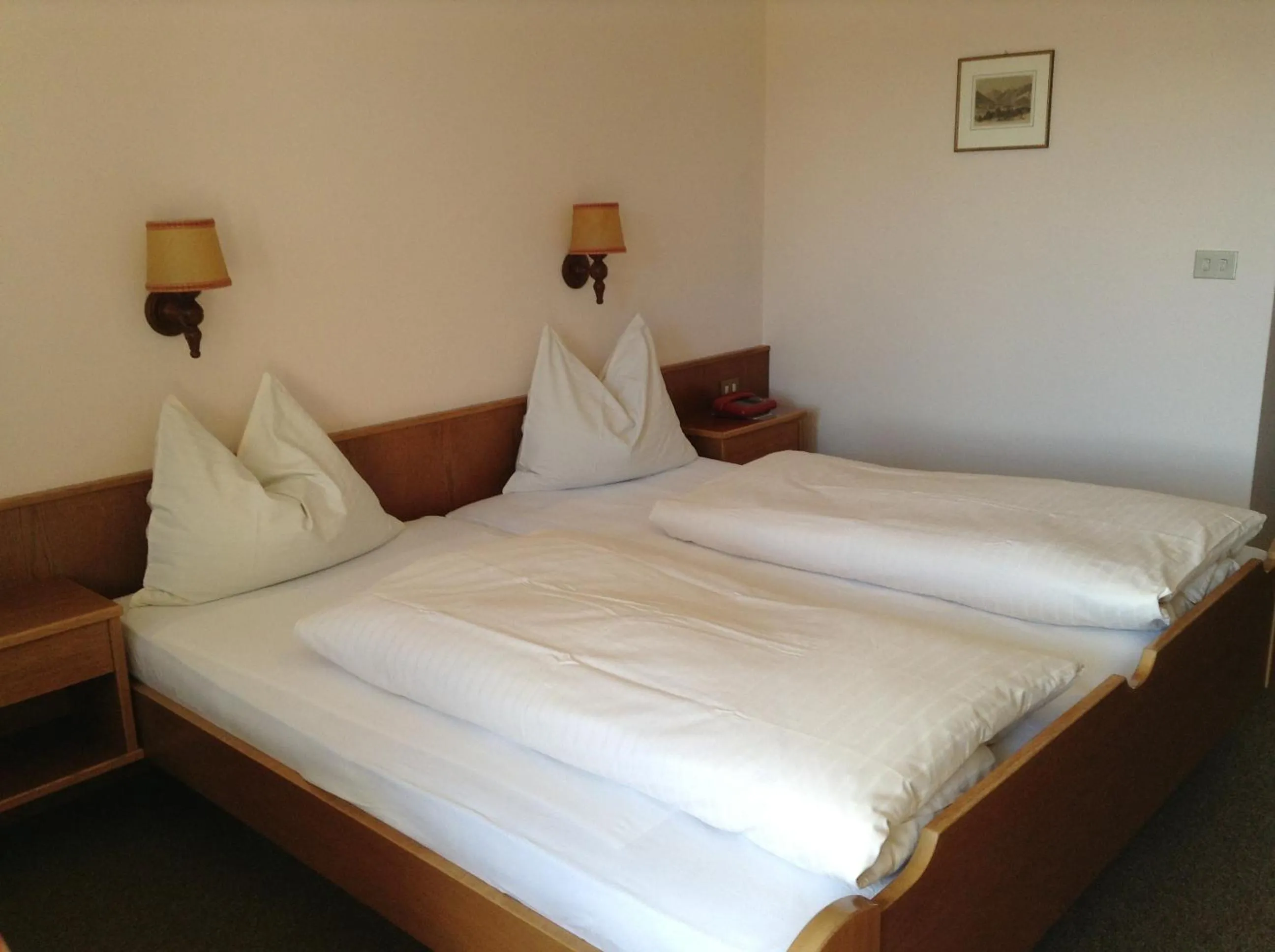 Bed in Hotel Tannerhof