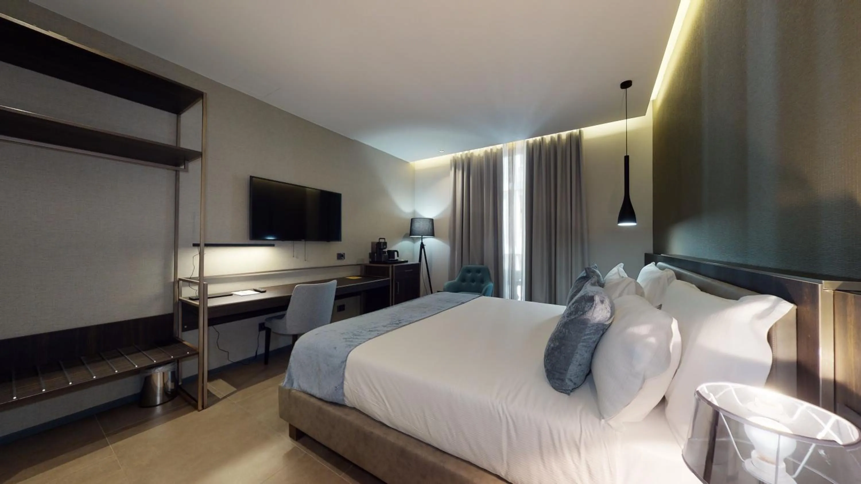 Bed in GALLERIA The Smart Boutique APARTHOTEL By OSPITAMI