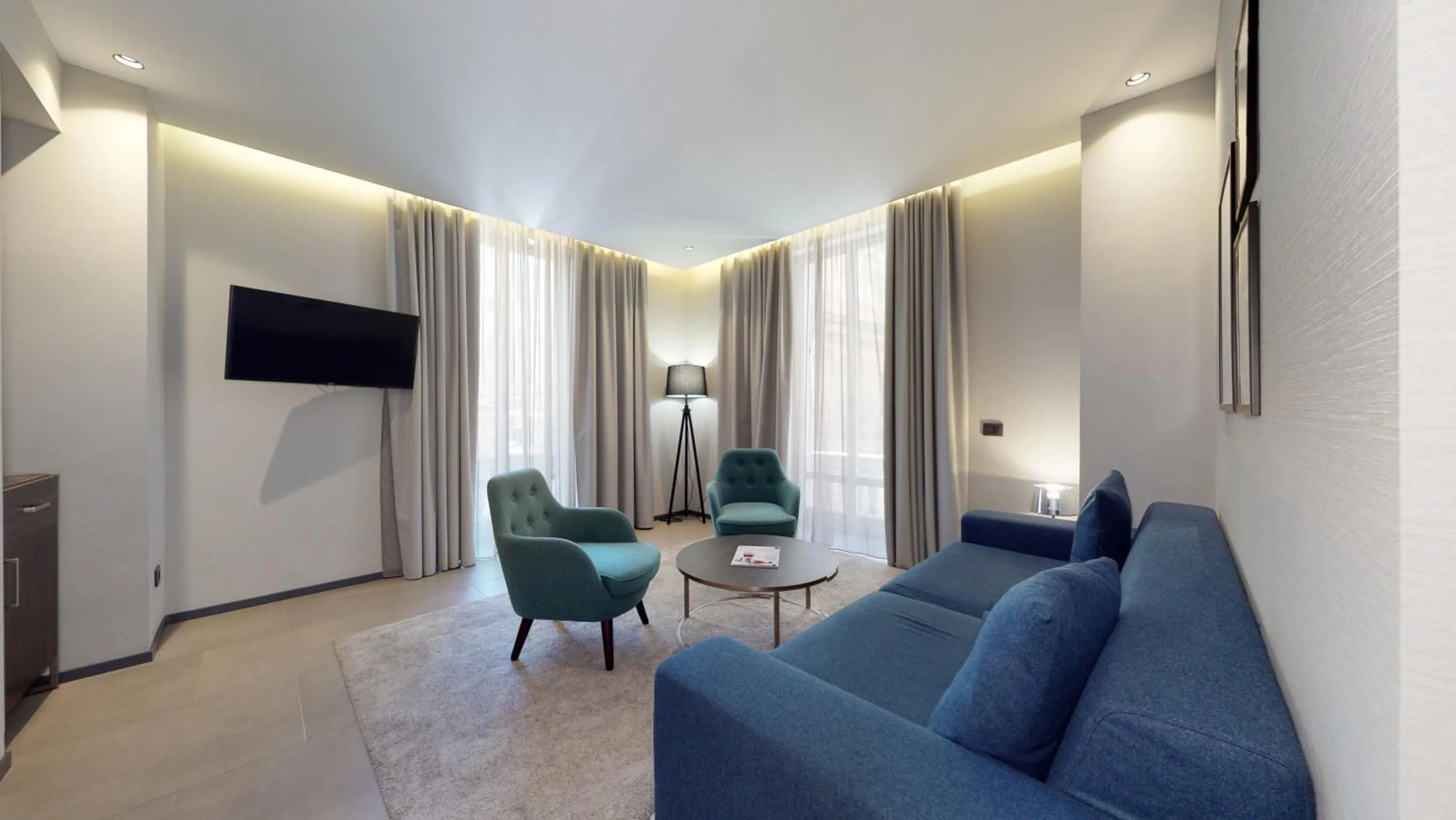 Living room in GALLERIA The Smart Boutique APARTHOTEL By OSPITAMI