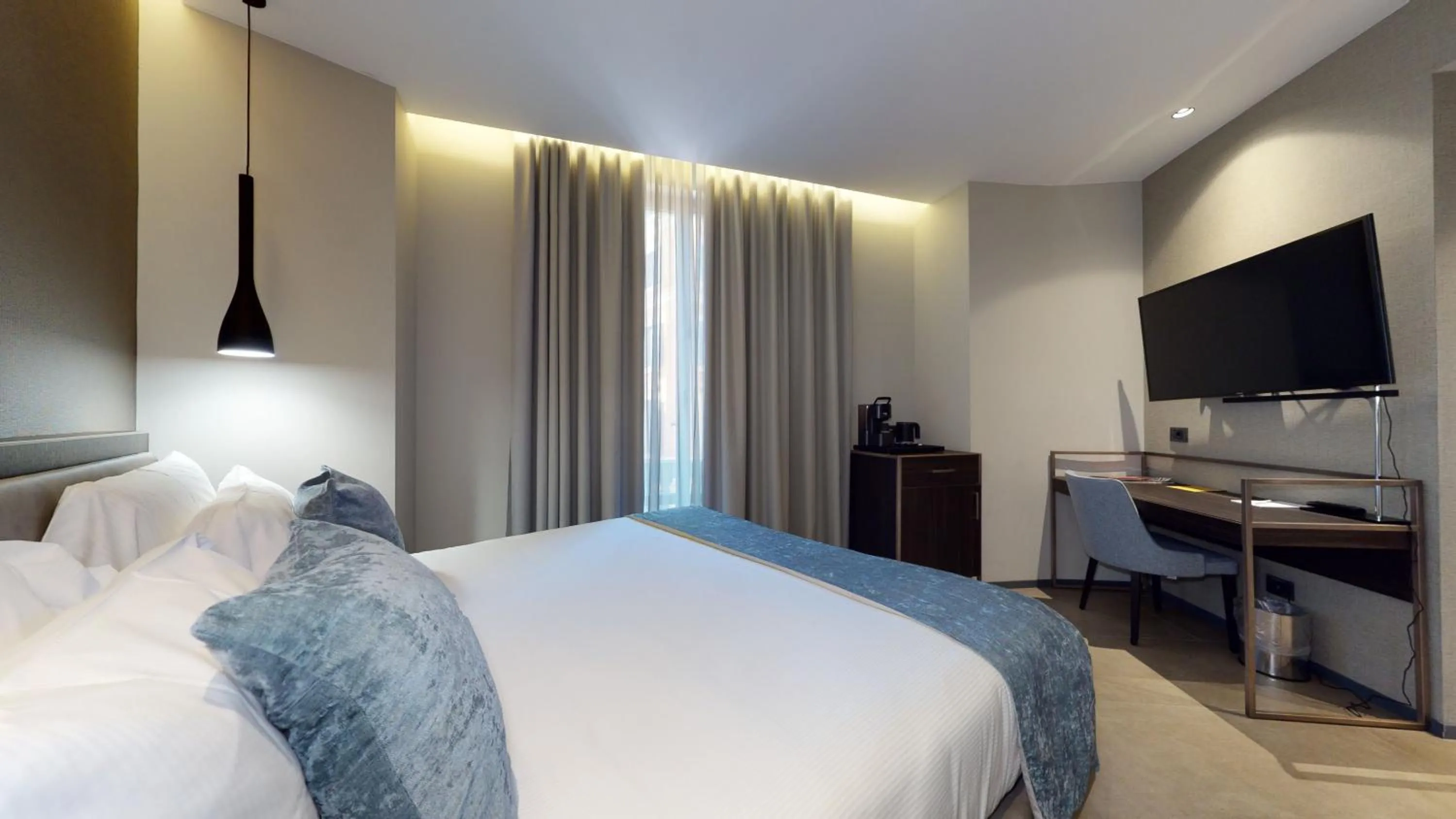 Bed in GALLERIA The Smart Boutique APARTHOTEL By OSPITAMI