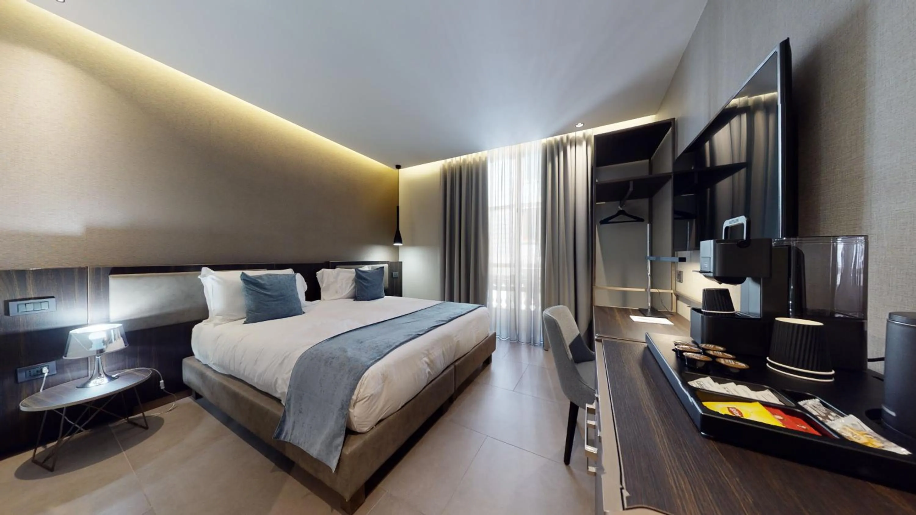 Bed in GALLERIA The Smart Boutique APARTHOTEL By OSPITAMI