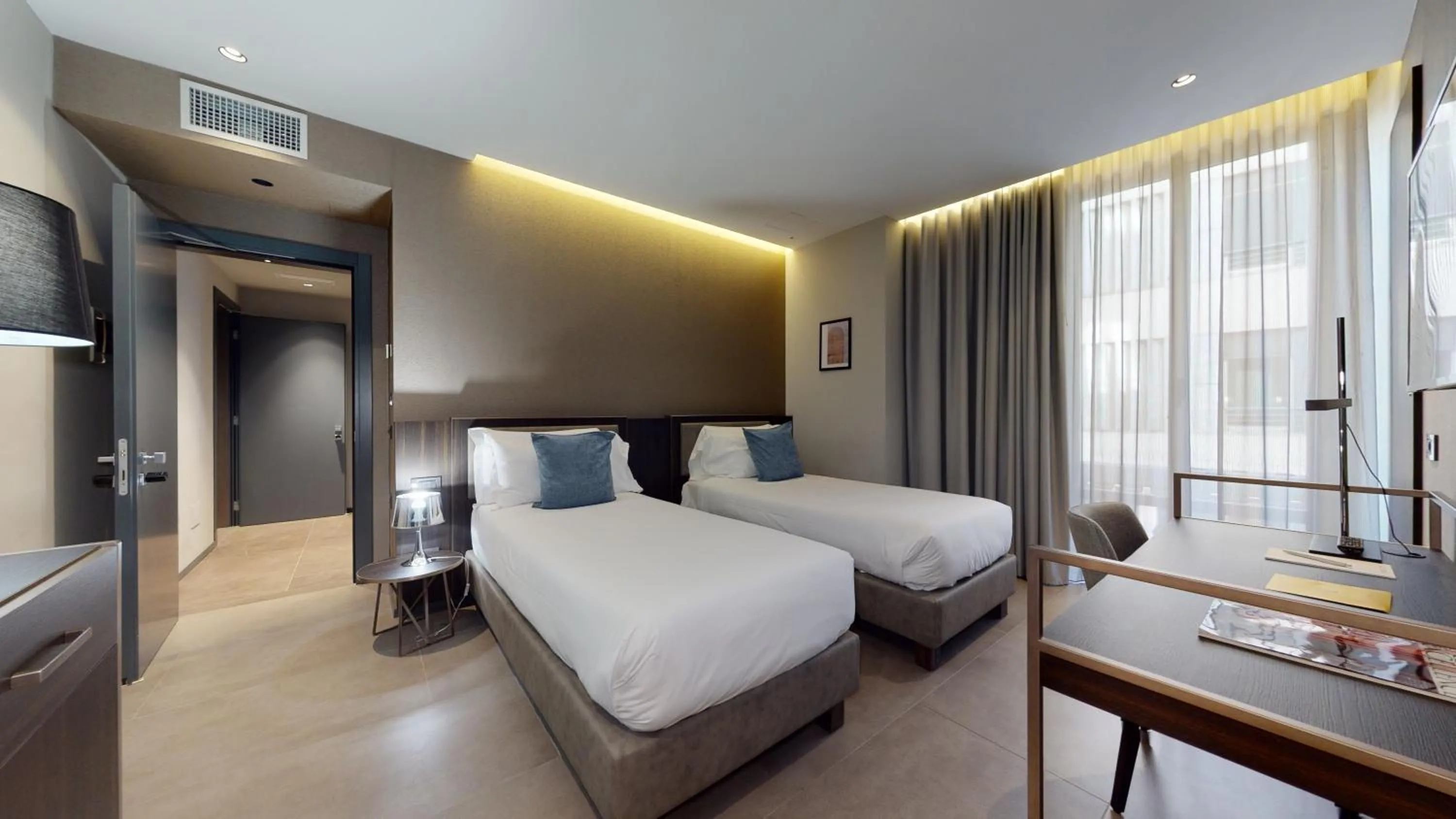 Bed in GALLERIA The Smart Boutique APARTHOTEL By OSPITAMI