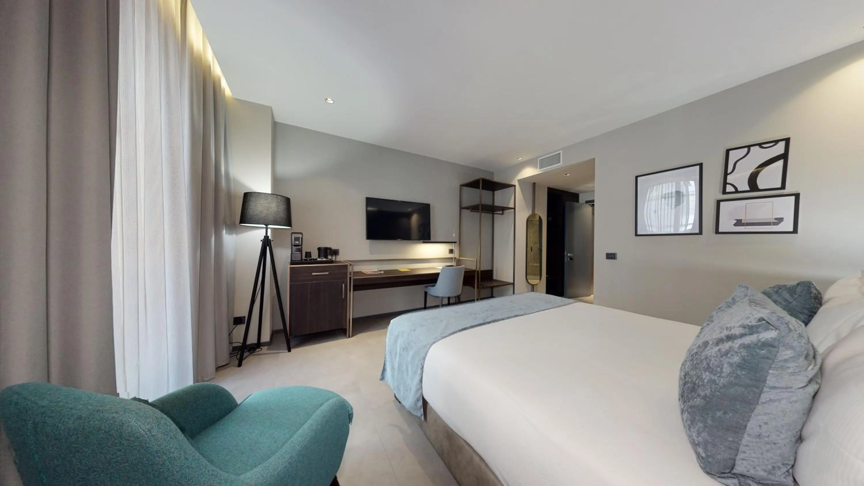 Photo of the whole room, Bed in GALLERIA The Smart Boutique APARTHOTEL By OSPITAMI