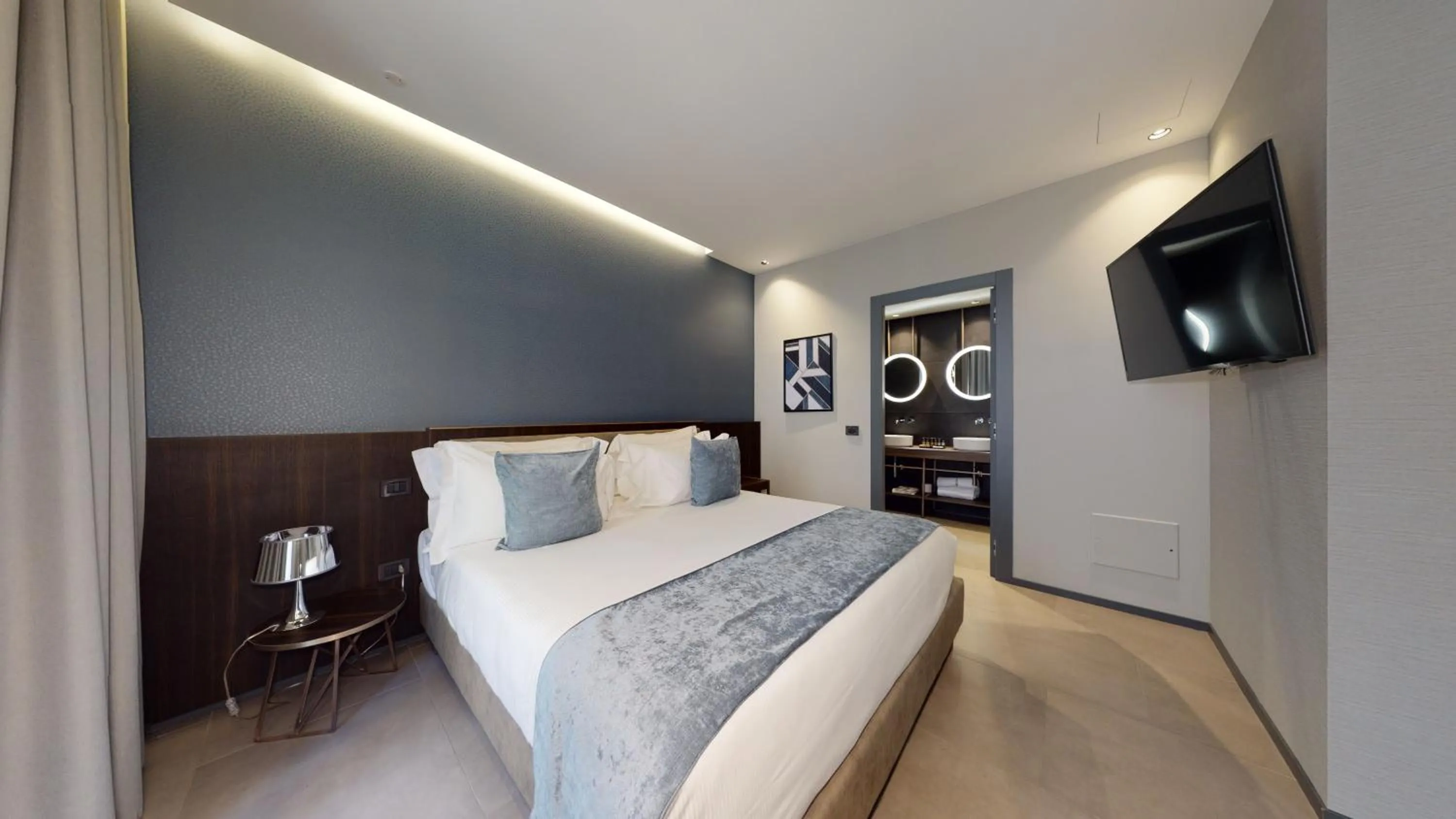 Bed in GALLERIA The Smart Boutique APARTHOTEL By OSPITAMI