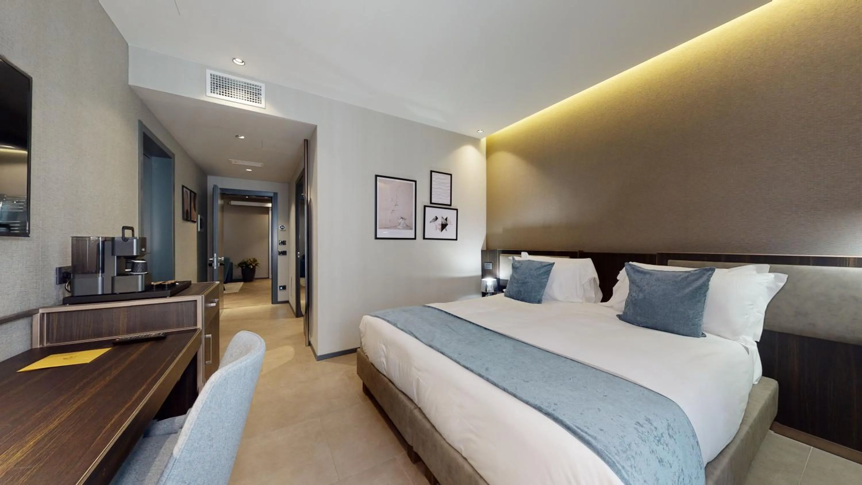 Bed in GALLERIA The Smart Boutique APARTHOTEL By OSPITAMI