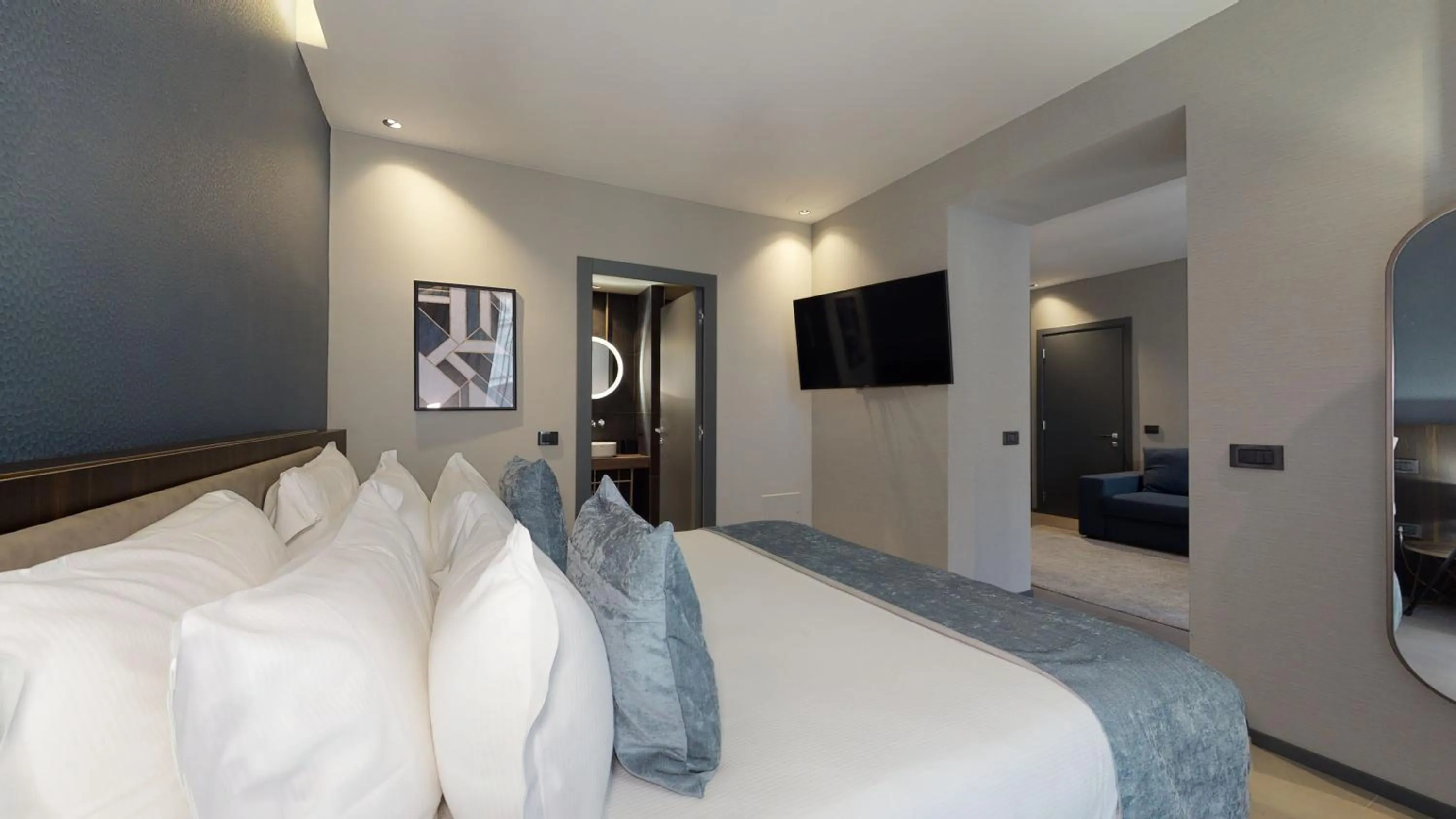 Bed in GALLERIA The Smart Boutique APARTHOTEL By OSPITAMI