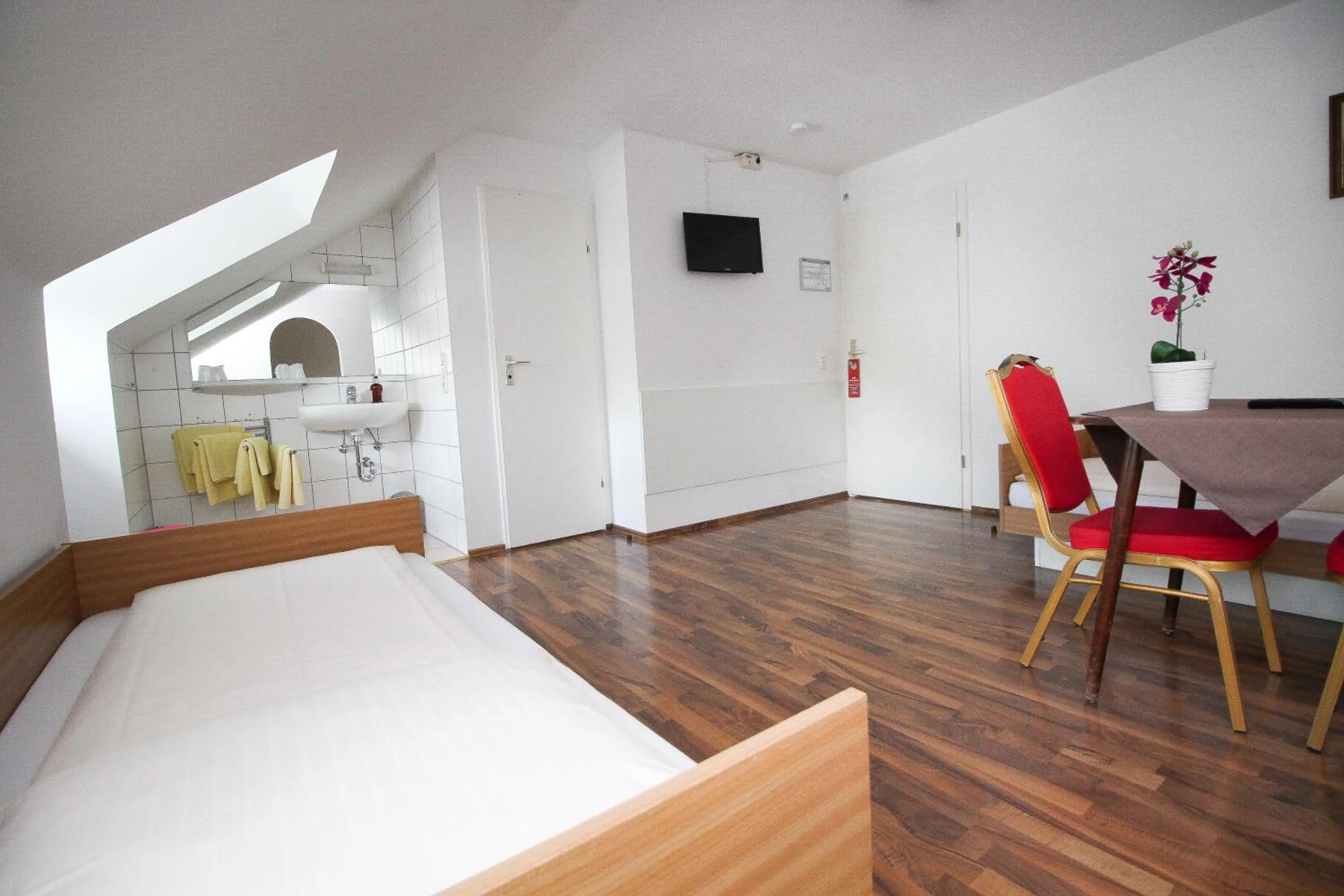 Bed in Hotel Olympia