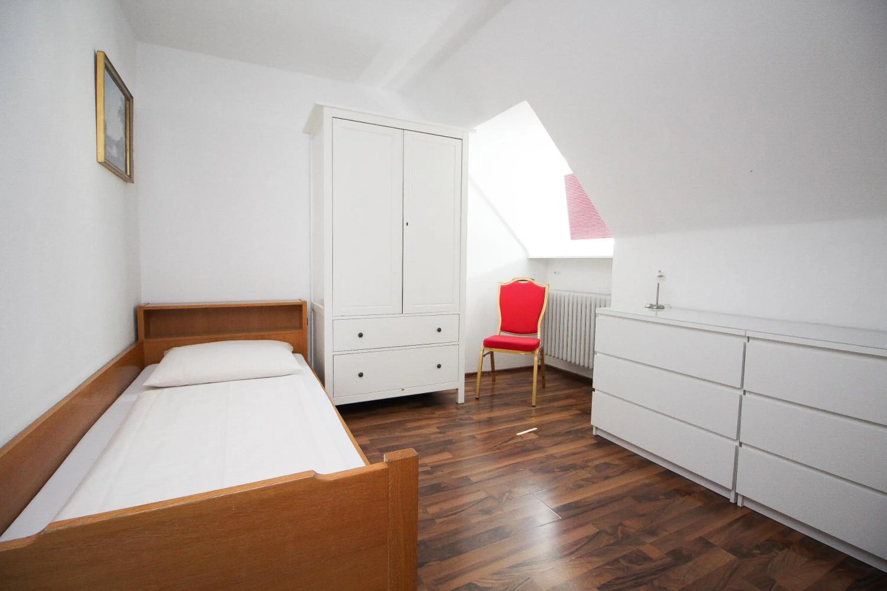 Bed in Hotel Olympia